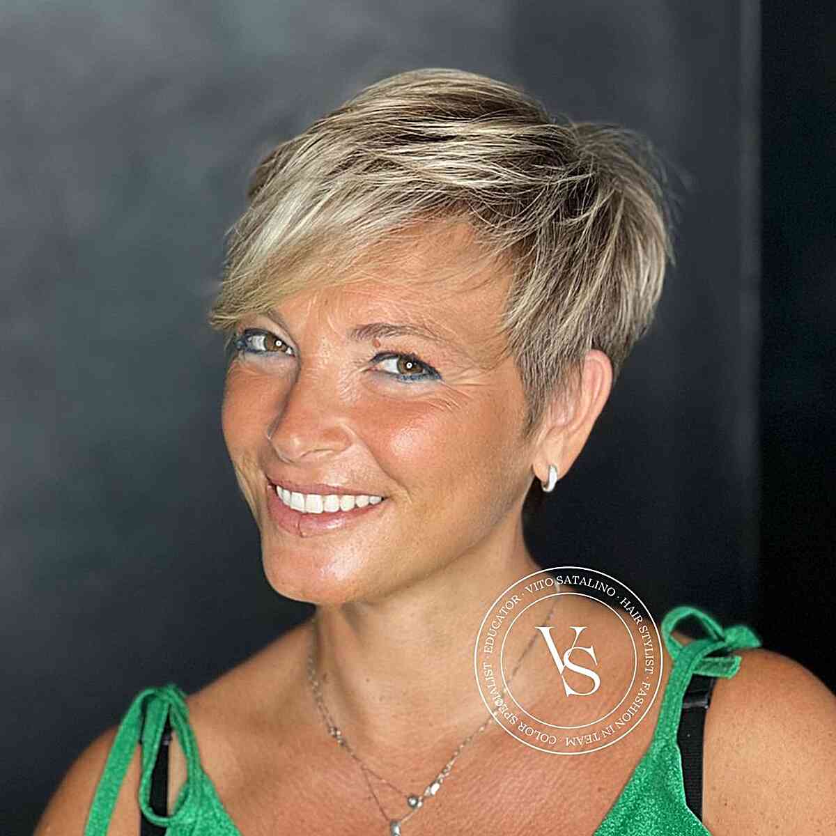 Textured Side-Swept Blonde Pixie with Bangs for Women Aged 50 with Thin Hair