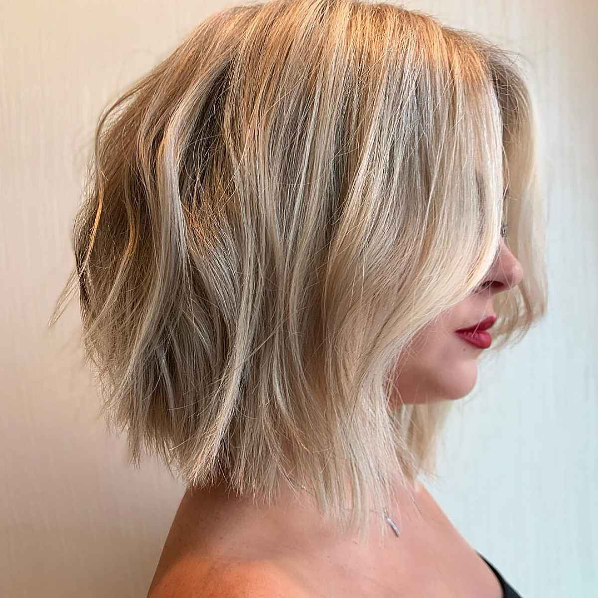 Textured soft blonde lob with dimension