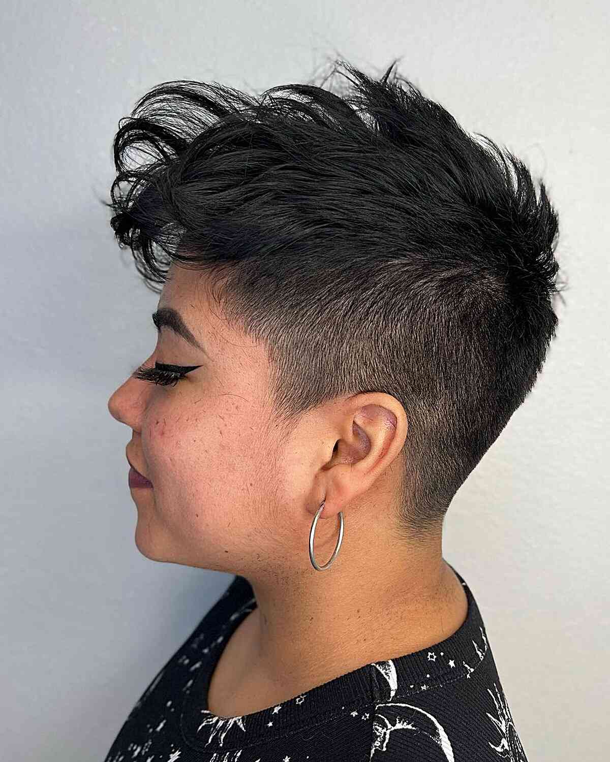 Textured Undercut Short Hairstyle for Women with Round Faces