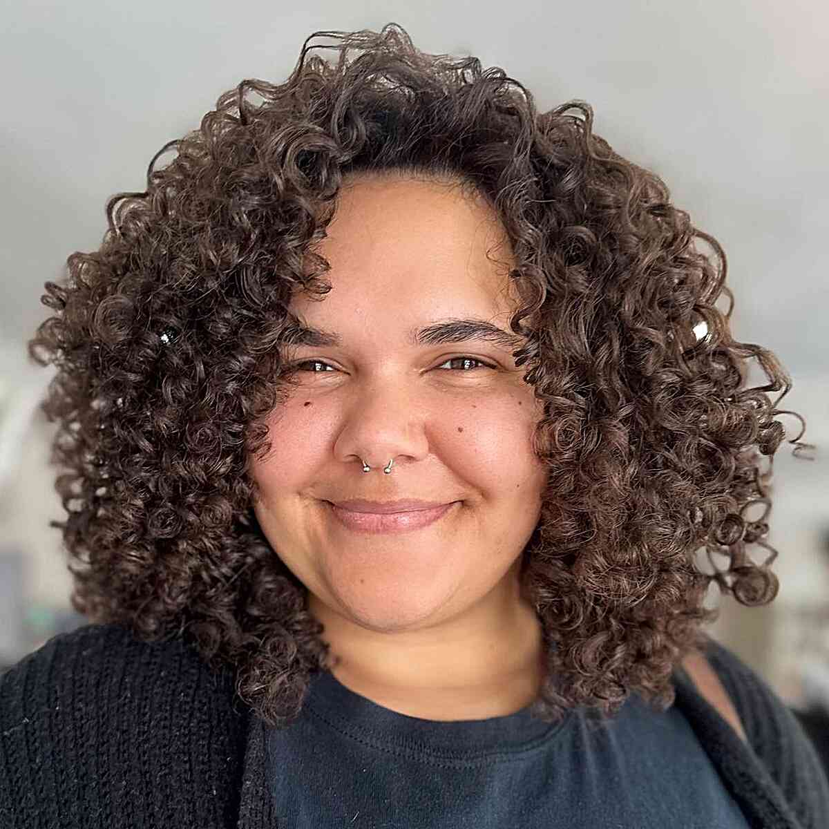 Textured Waves + Coiled Styles for Women with double chins and deeper skin tones