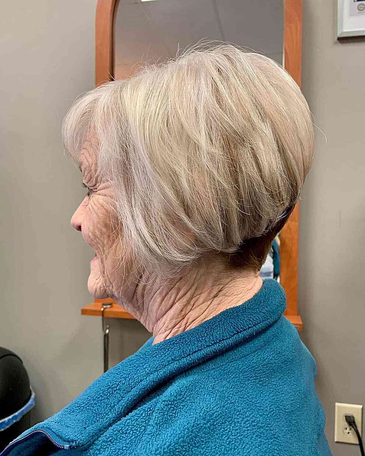 Stylish Short Textured Wedge Bob Hairstyle for Older Women Over 70