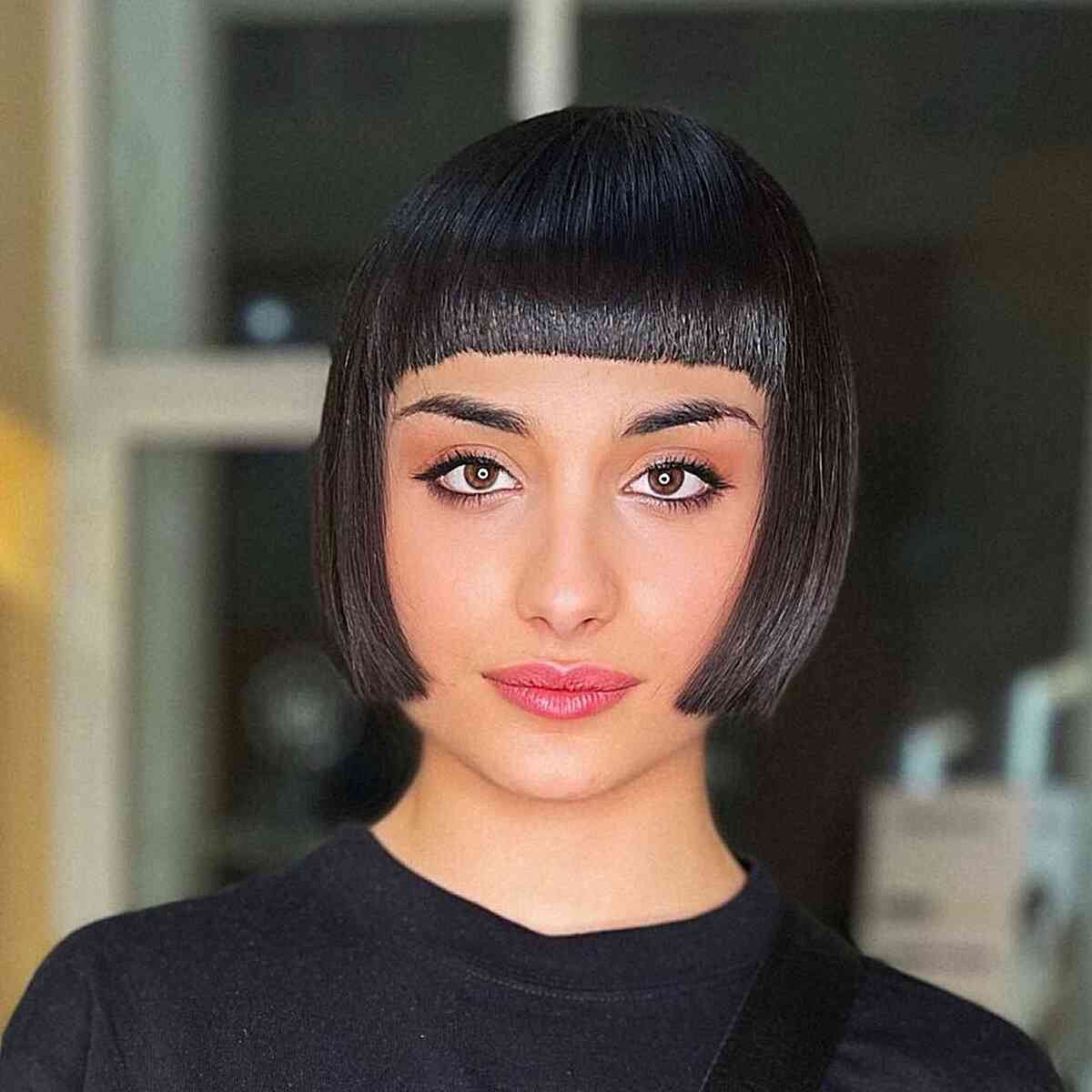 The Most Stylish Jaw-Length Blunt Cut Bob with Straight Fringe