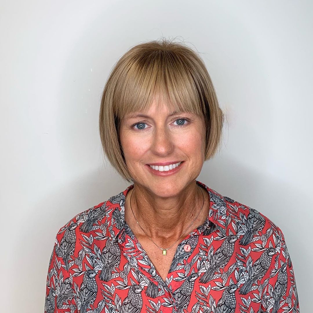 The Stylish Asymmetrical Bob Featuring Bangs