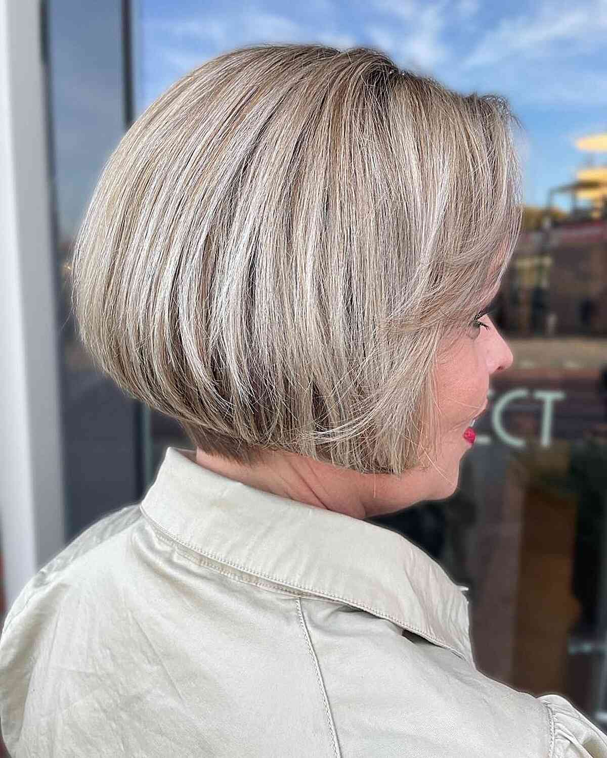 Timeless Short Bob with Highlights and Side Bangs for Thick Hair