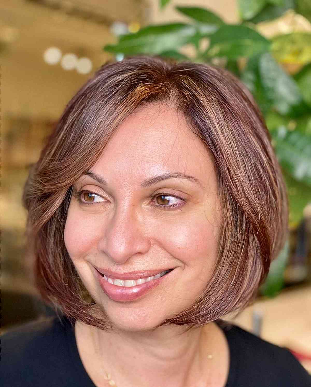 Timeless Chin-Length Bob with Face-Enhancing Layers for 40-Year-Olds