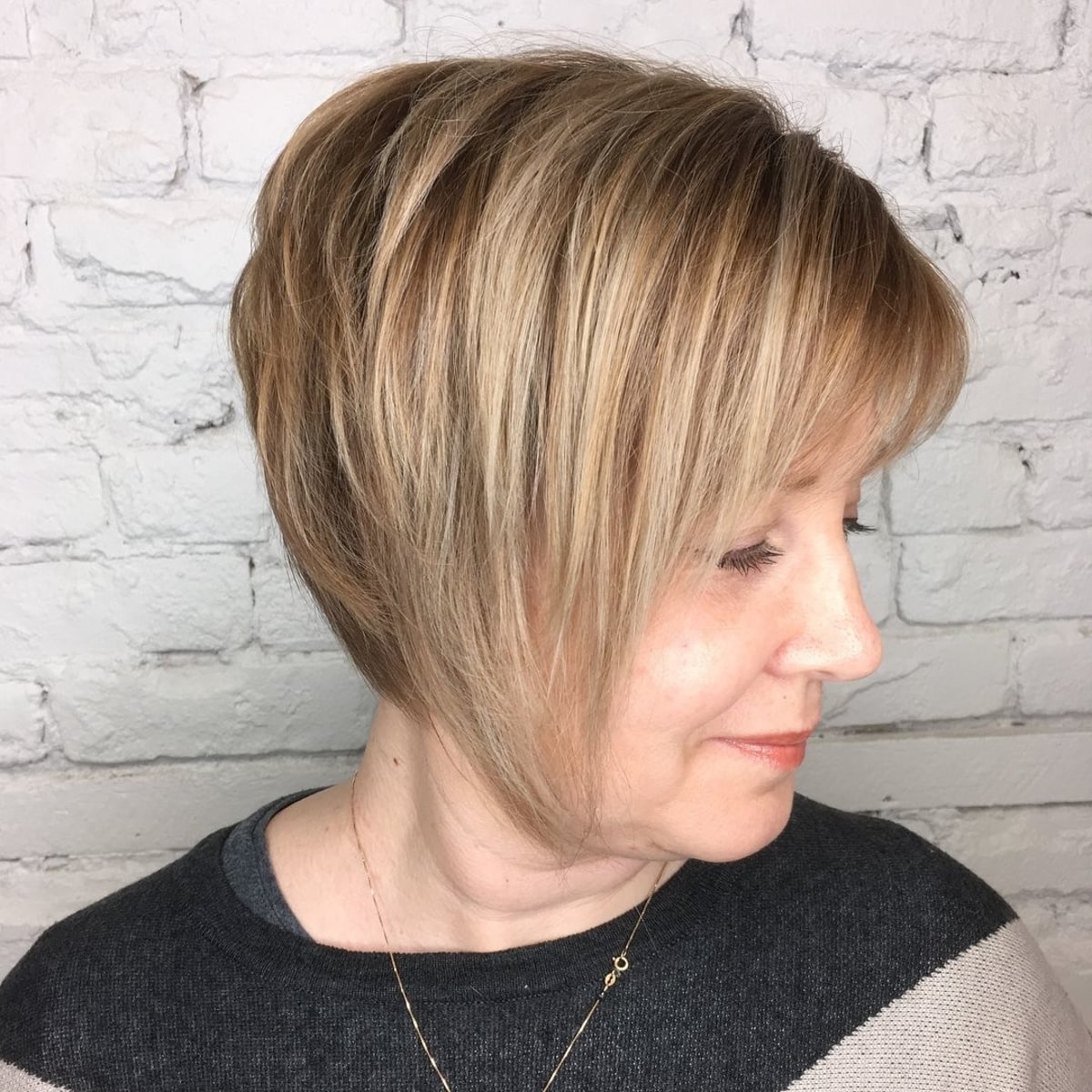 Top caramel blonde with lowlights for women over 60