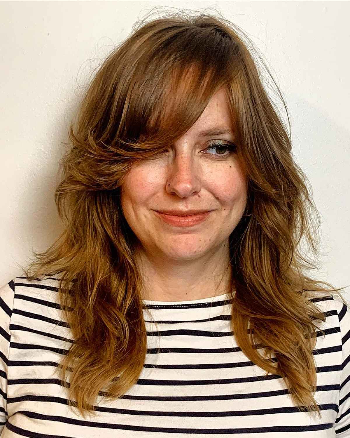 Top Feathered Side-Swept Bangs to Try