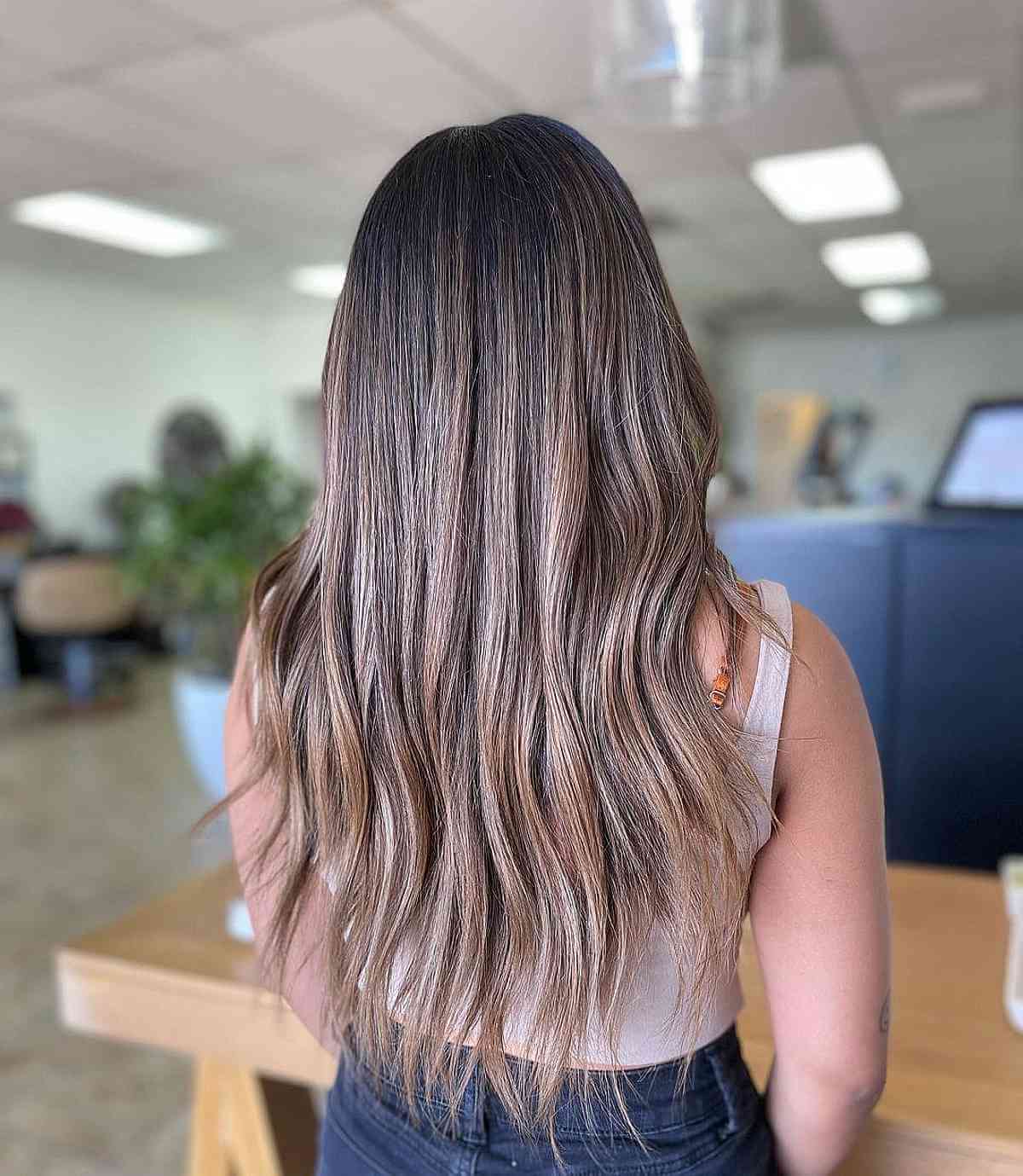 Transformative Color Melt Featuring Ashy Hair Tones and a Partial Balayage