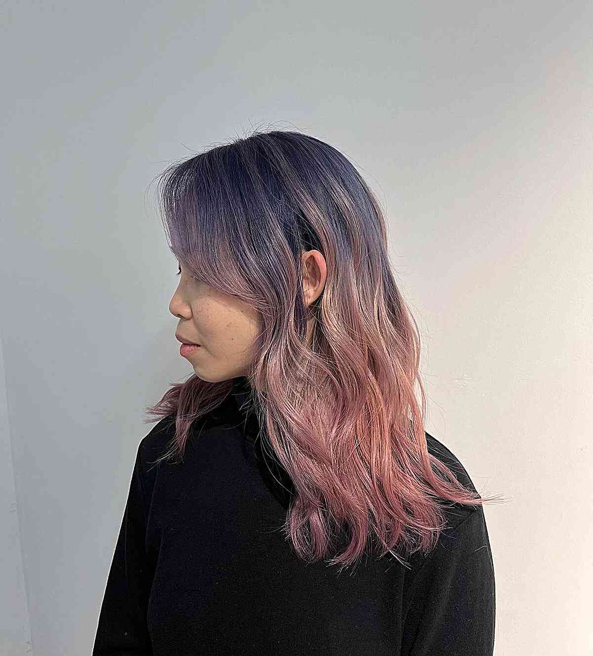 Image showcasing a rose gold ombre hair color