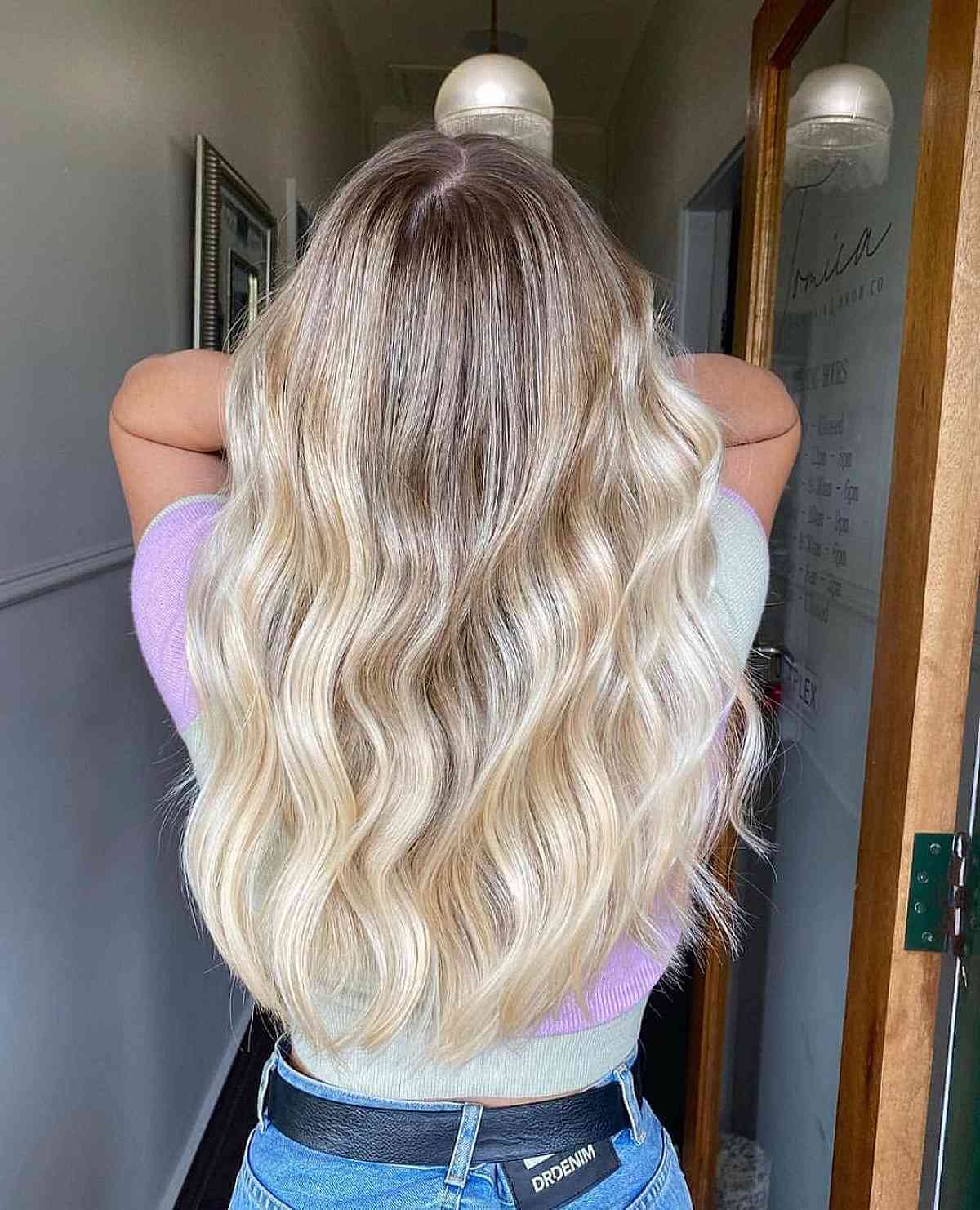 Transitioning from Light Brown to Platinum Blonde Balayage