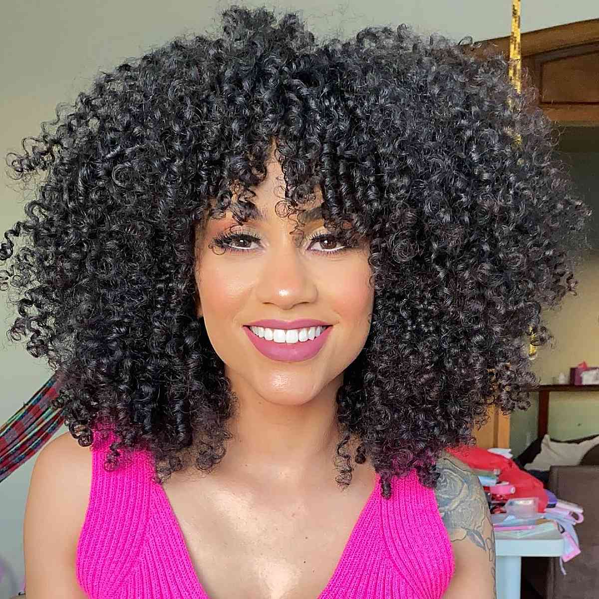 Trendy natural curly bangs for black women