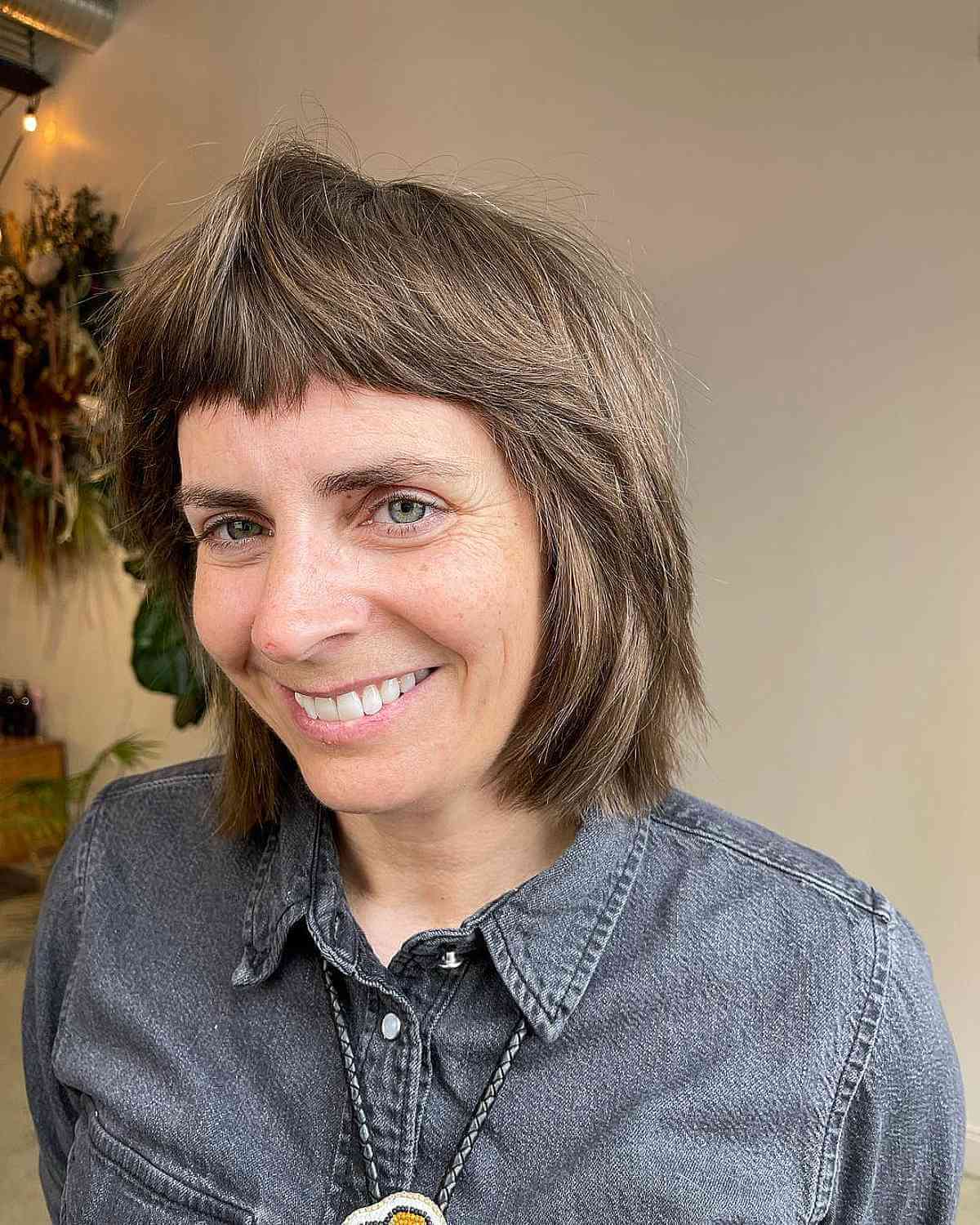 Trendy Baby Wolf Cut with Micro Bangs for a 40-Year-Old Woman
