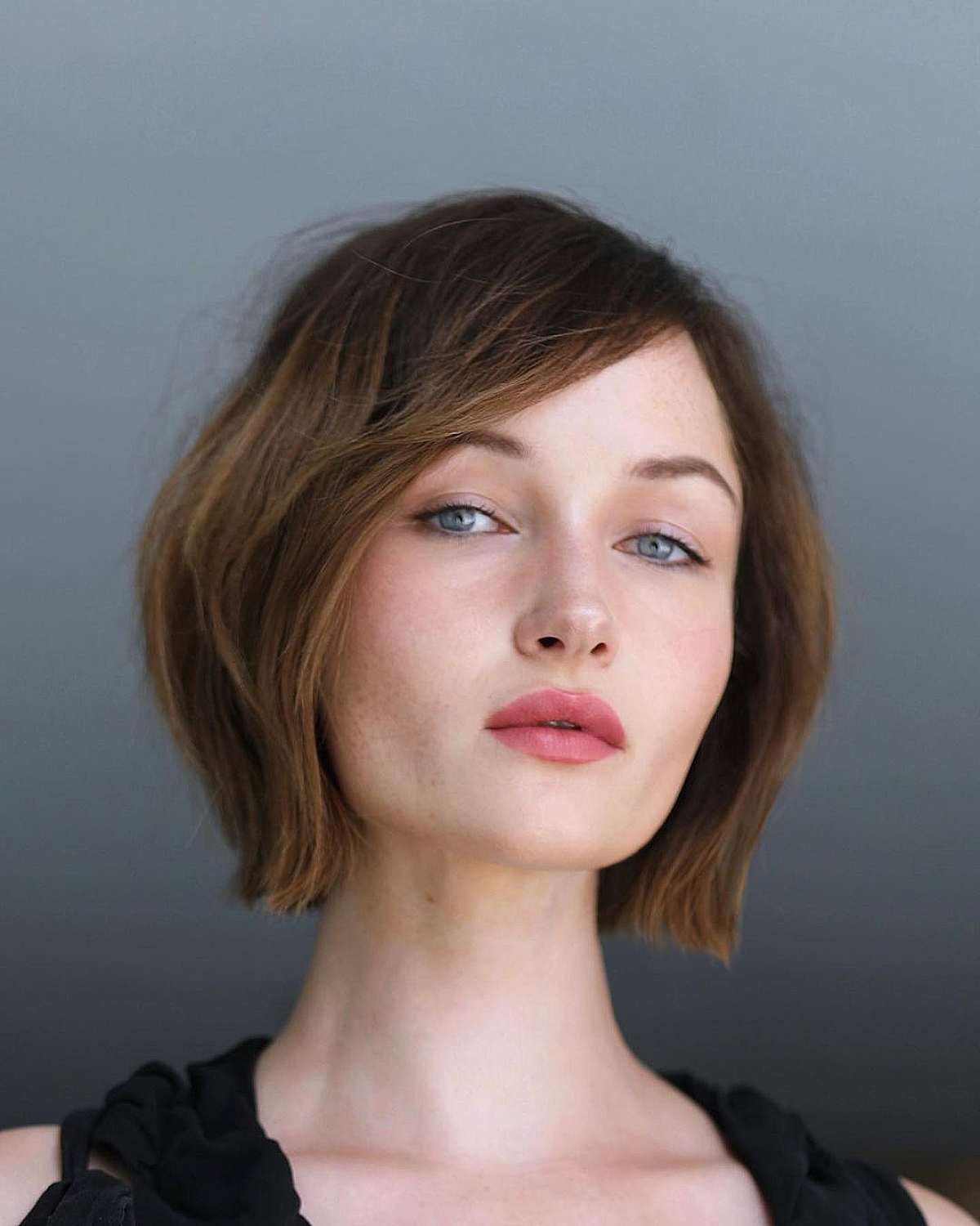 Trendy Brunette Side-Parted Blunt Bob