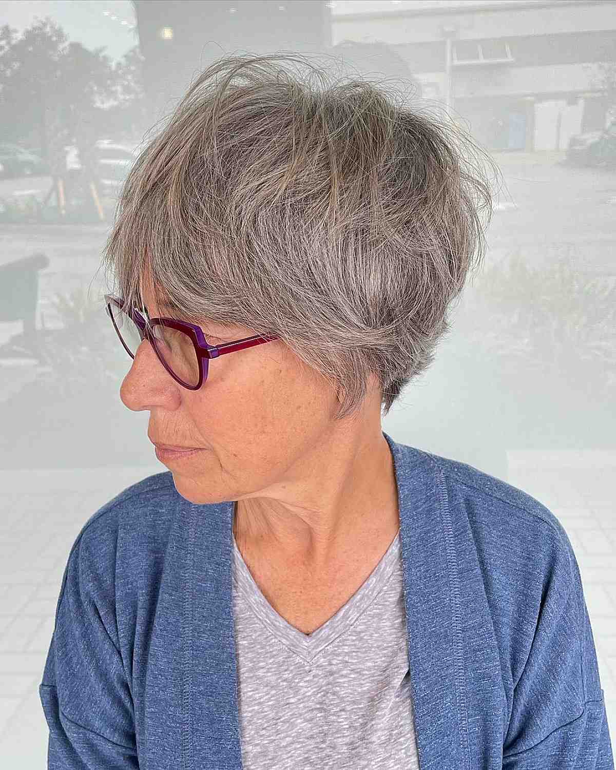 trendy long layered pixie for gray hair