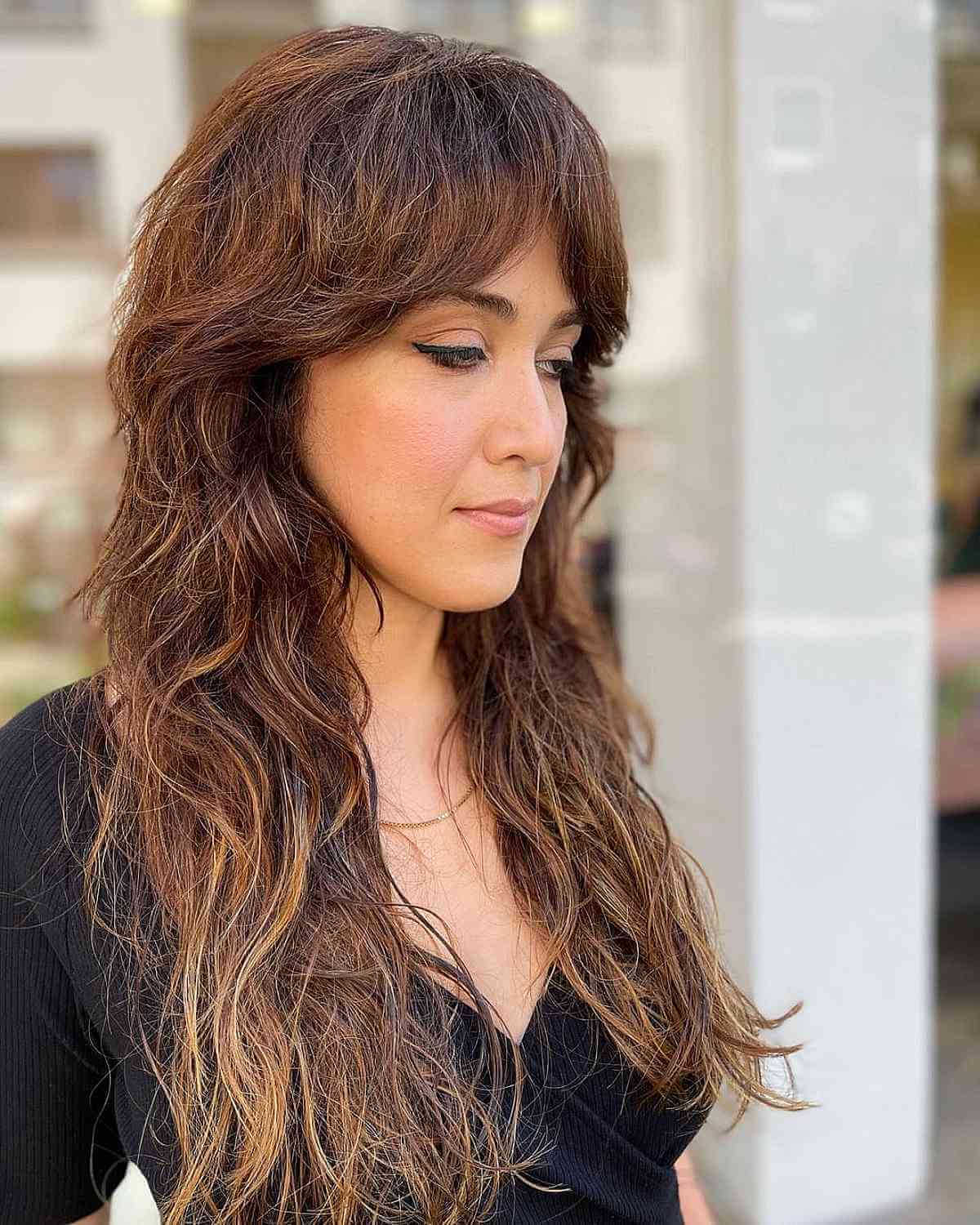 Trendy Long Razor Cut Shag with Curtain Bangs