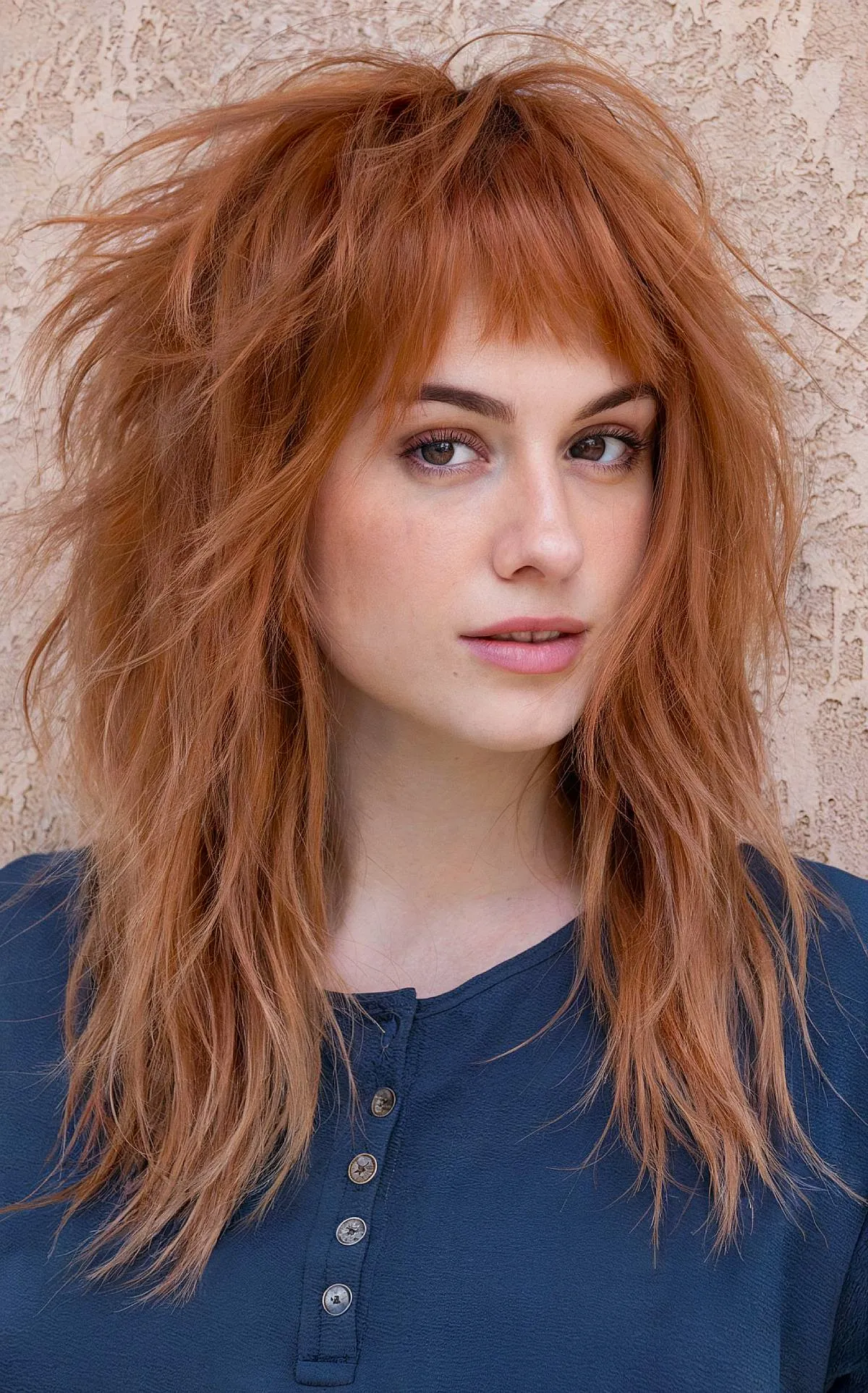 Trendy Long Wolf Cut Featuring Choppy Bangs for Wavy Hair