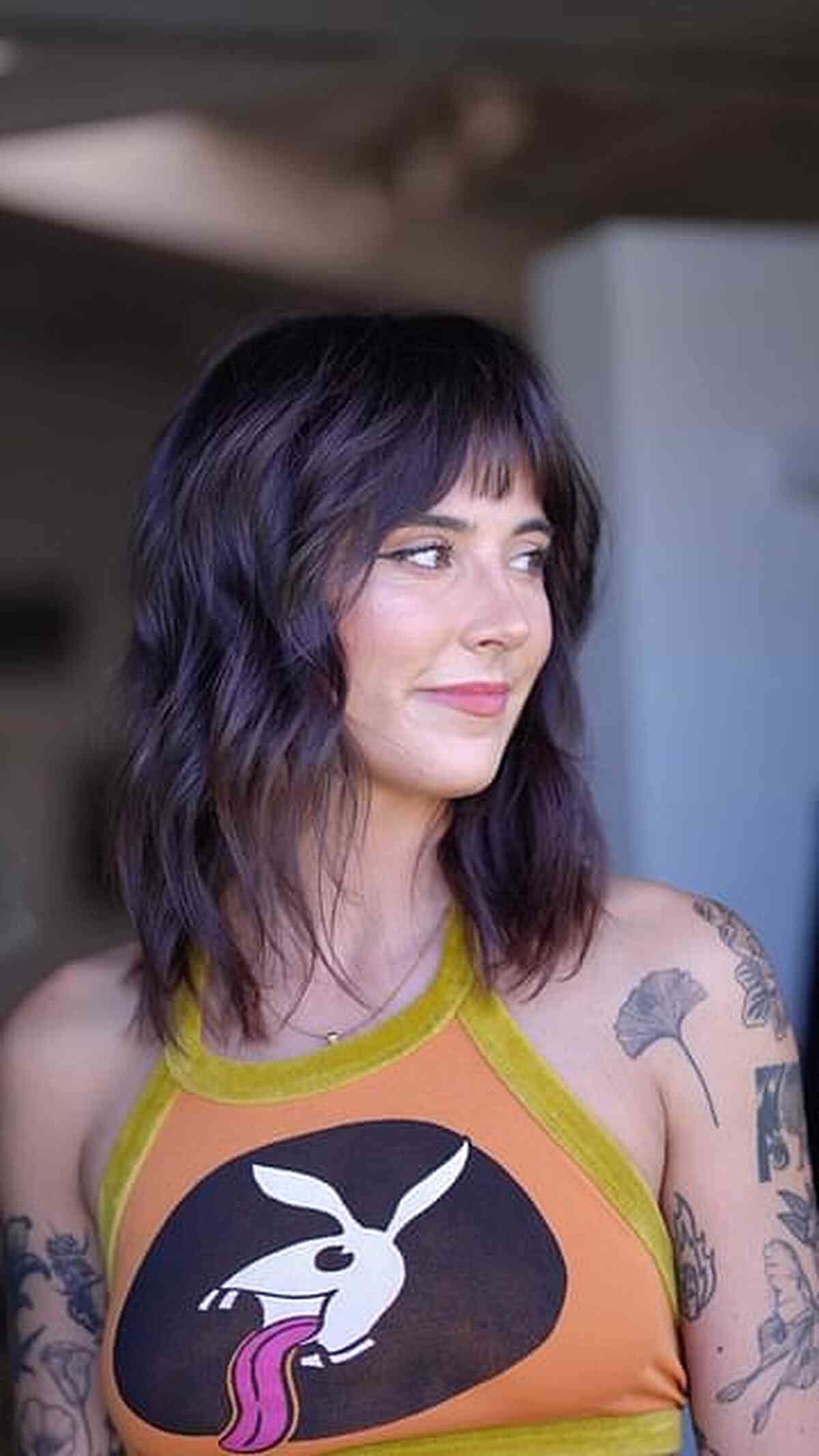 Trendy Medium Shag Hairstyle with Fringe