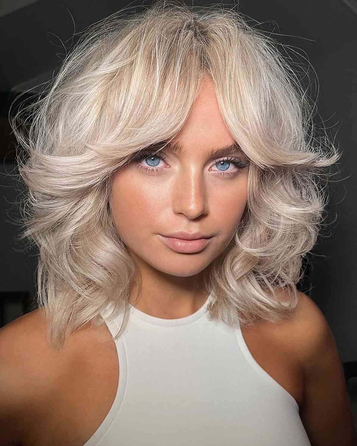 Trendy Platinum Short Shag with Bottleneck Bangs