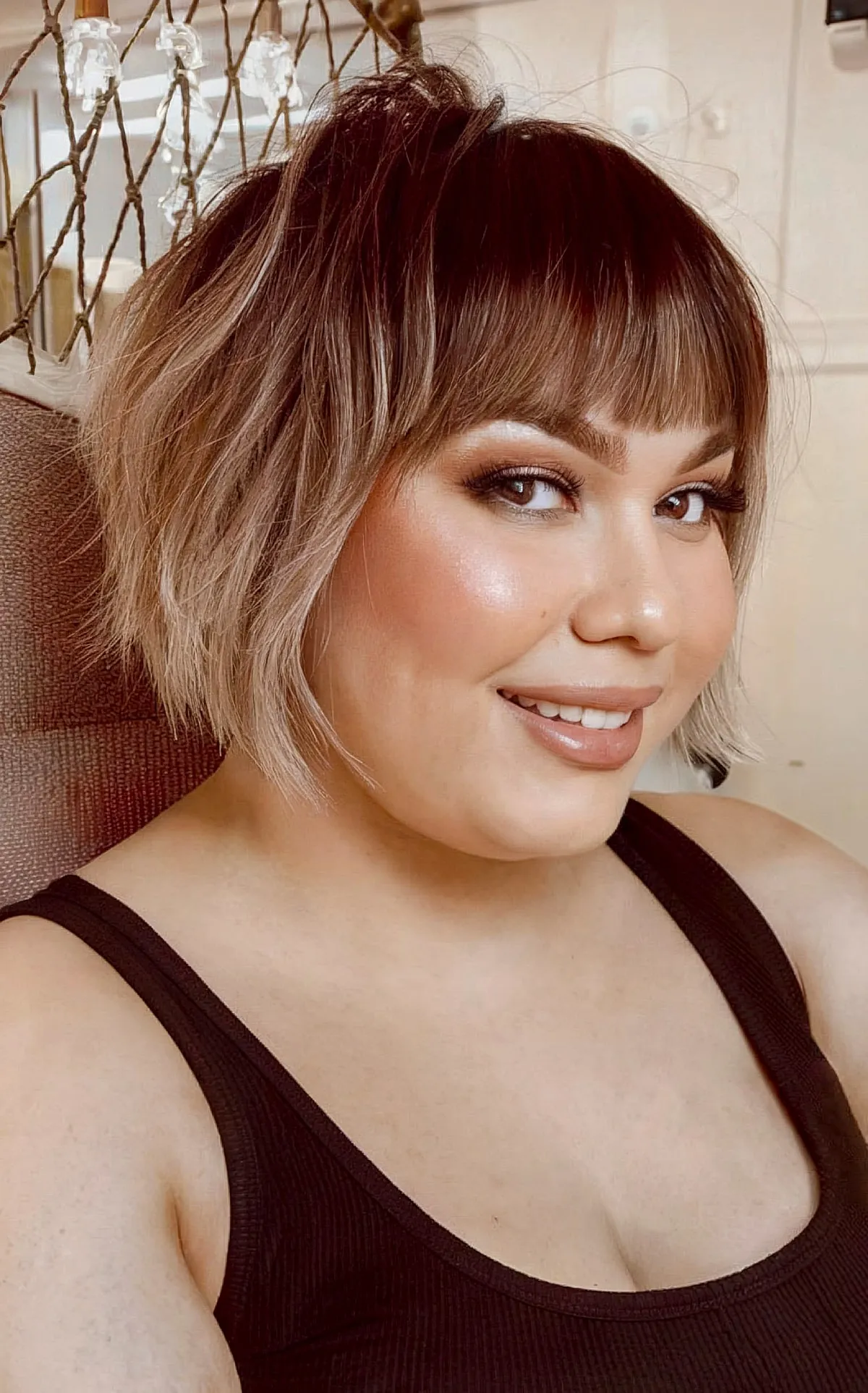 Trendy Razor Cut Bobbed Hairstyle with Textured Bangs for Ladies with Round Faces