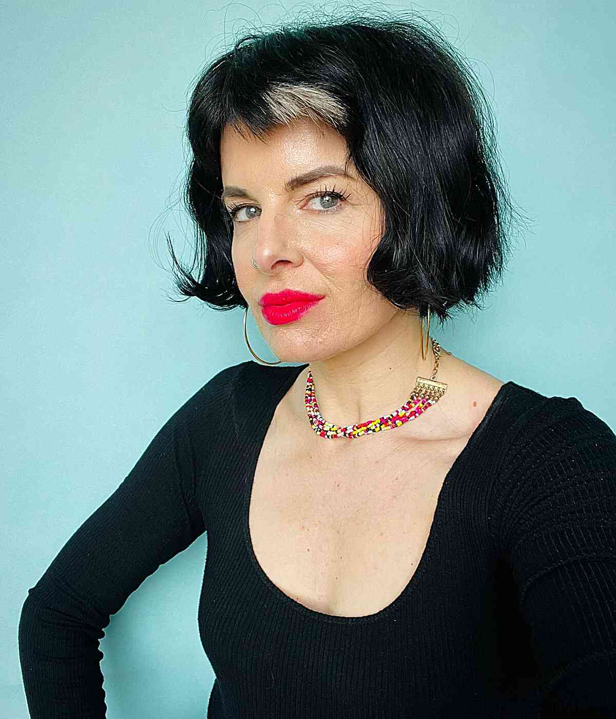 Jaw-Length Trendy Tiny Bob with Short Bangs for girls with an edgy vibe