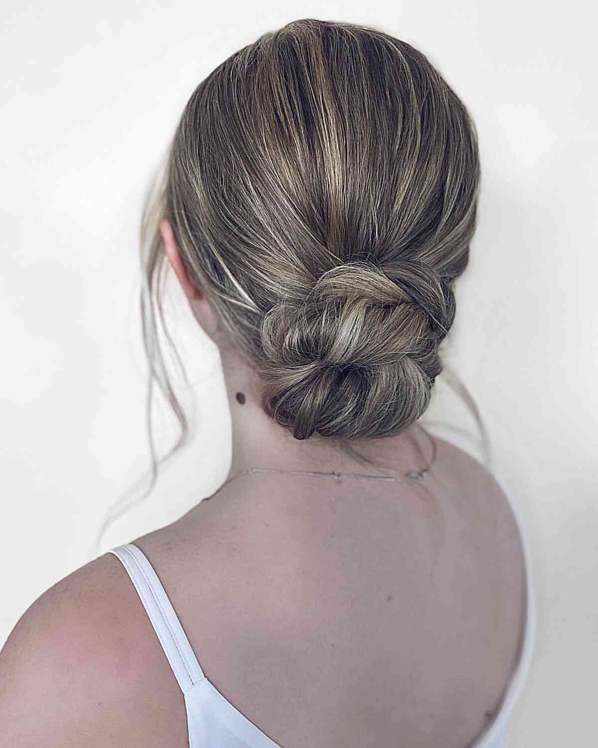 Bridesmaid-Inspired Low Twisted Bun on Bronde Hair Effortless Updo 