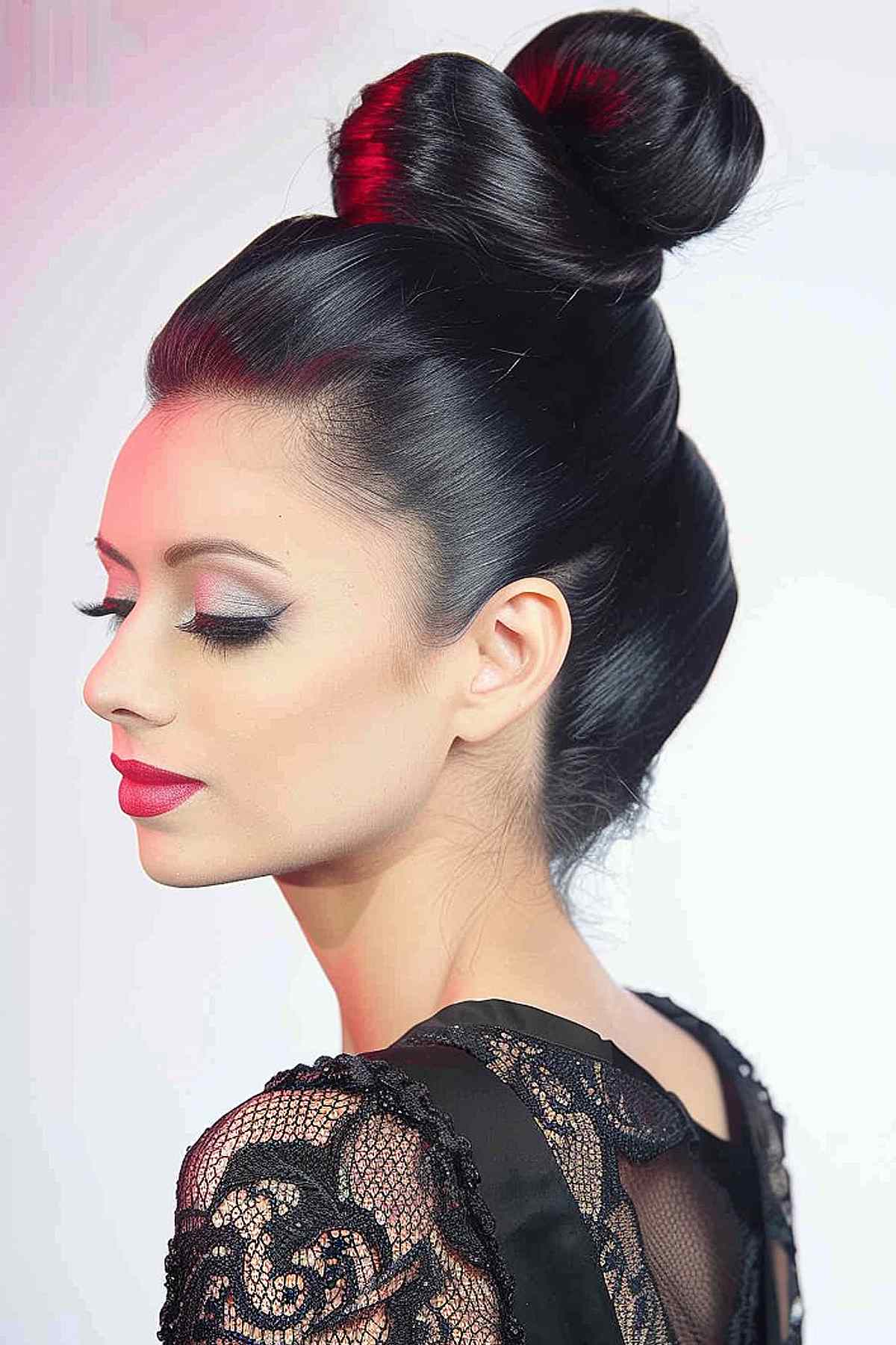 Stylish high ponytail styled into a sleek black Lady Samurai Bun updo.