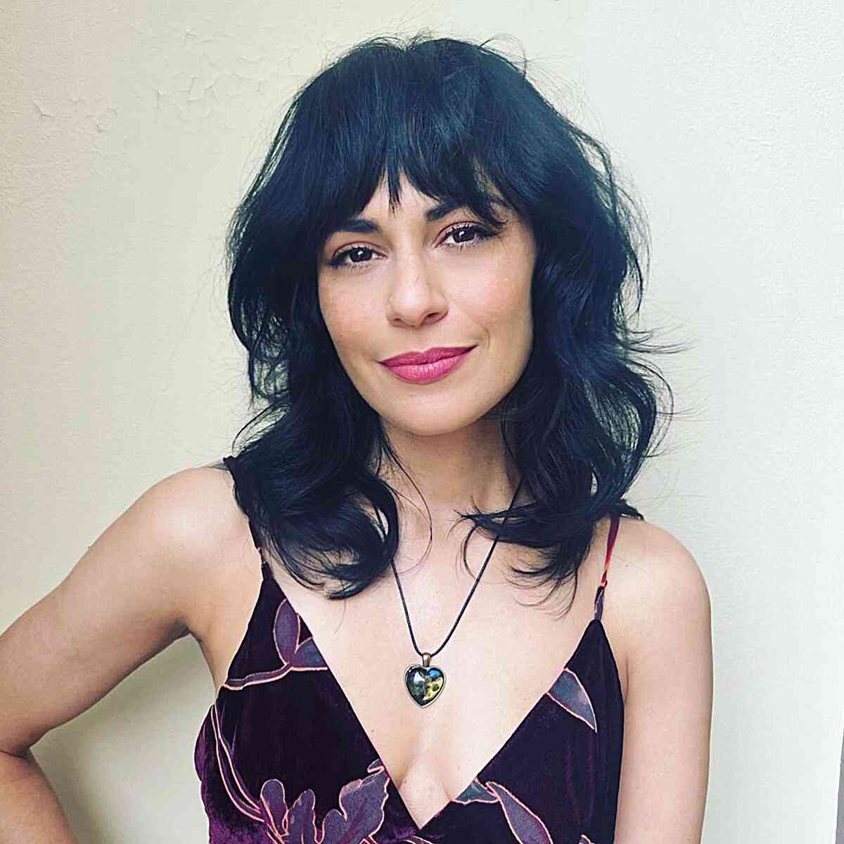 Collarbone-Length Feathered Hairstyle for women with stylish layers