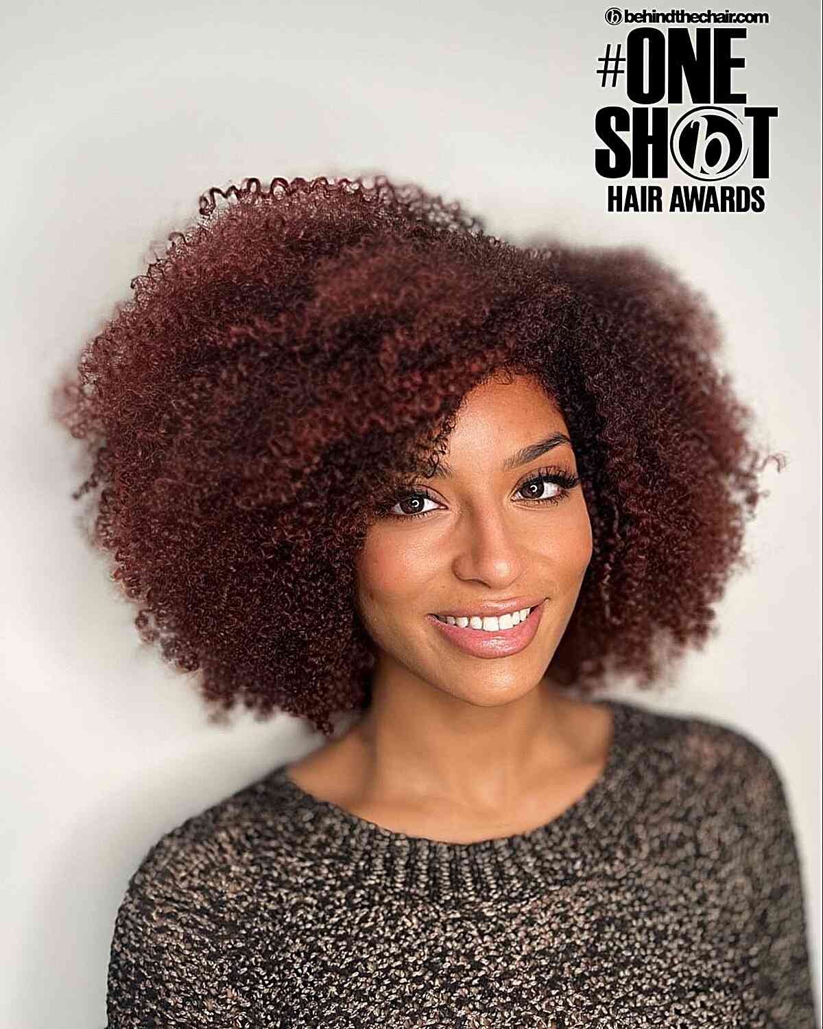 Natural Vibrant and Bold Side Part 'Fro for black ladies with dark red hair