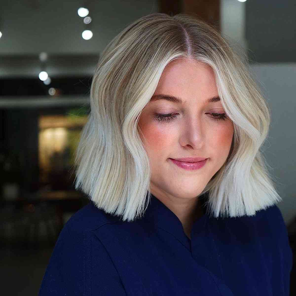Vibrant Blonde Blunt Bob with Deeper Roots