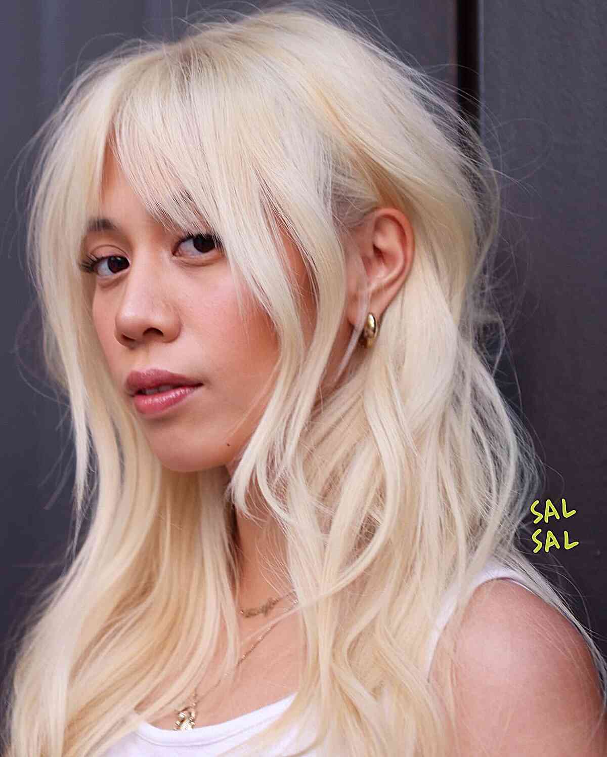 Vibrant Blonde Shag with Bardot Curtain Bangs