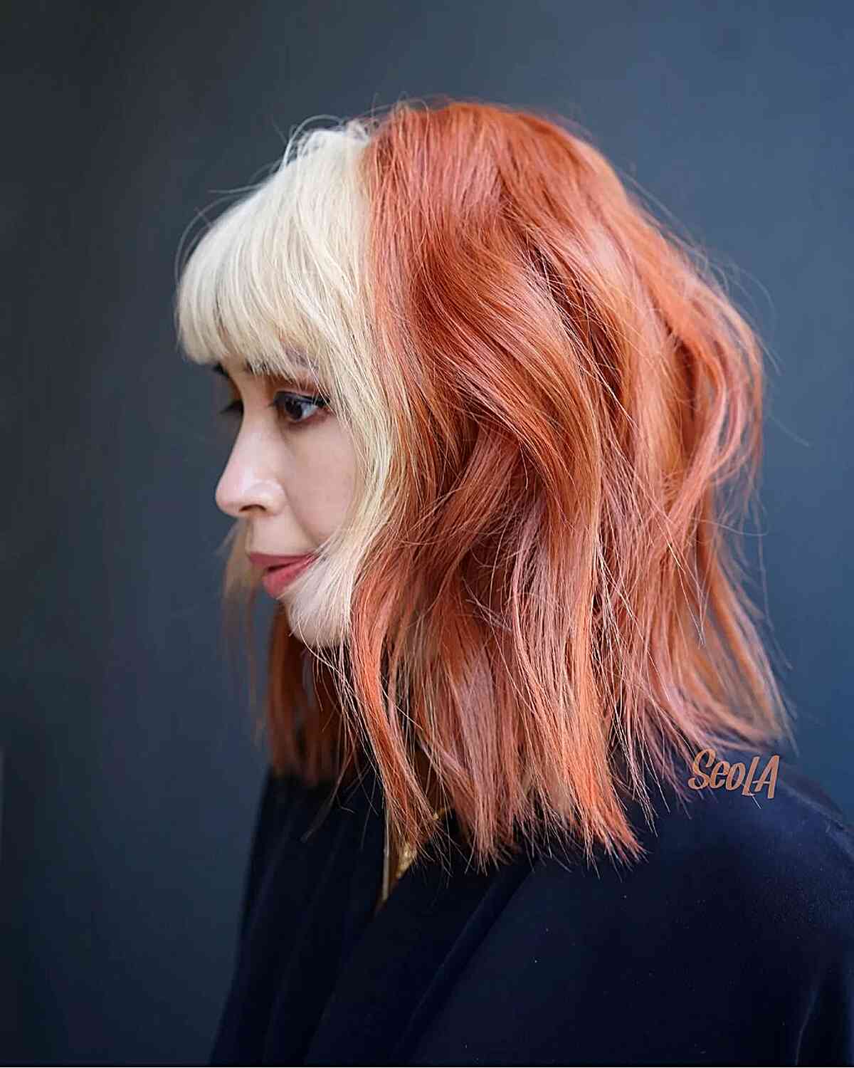 Vibrant Orange-Auburn Hair with White-Blonde Bangs