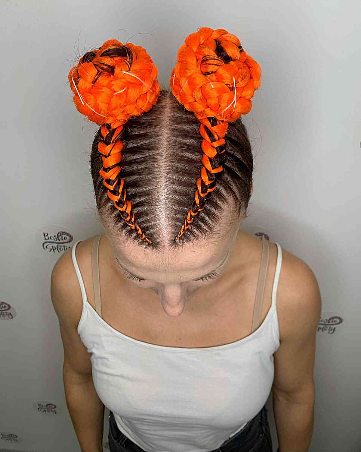 Various Vibrant Orange Braided Space Buns