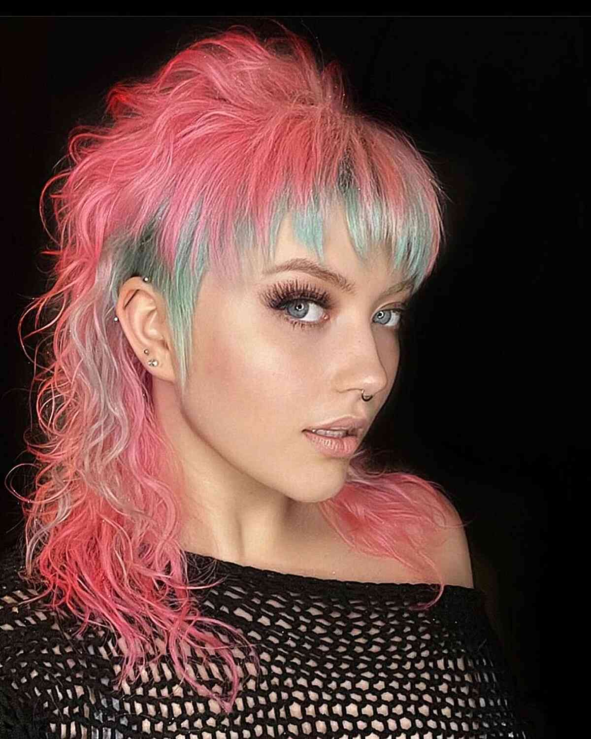 Vibrant Pink Mid-Length Hair with Teal Highlights