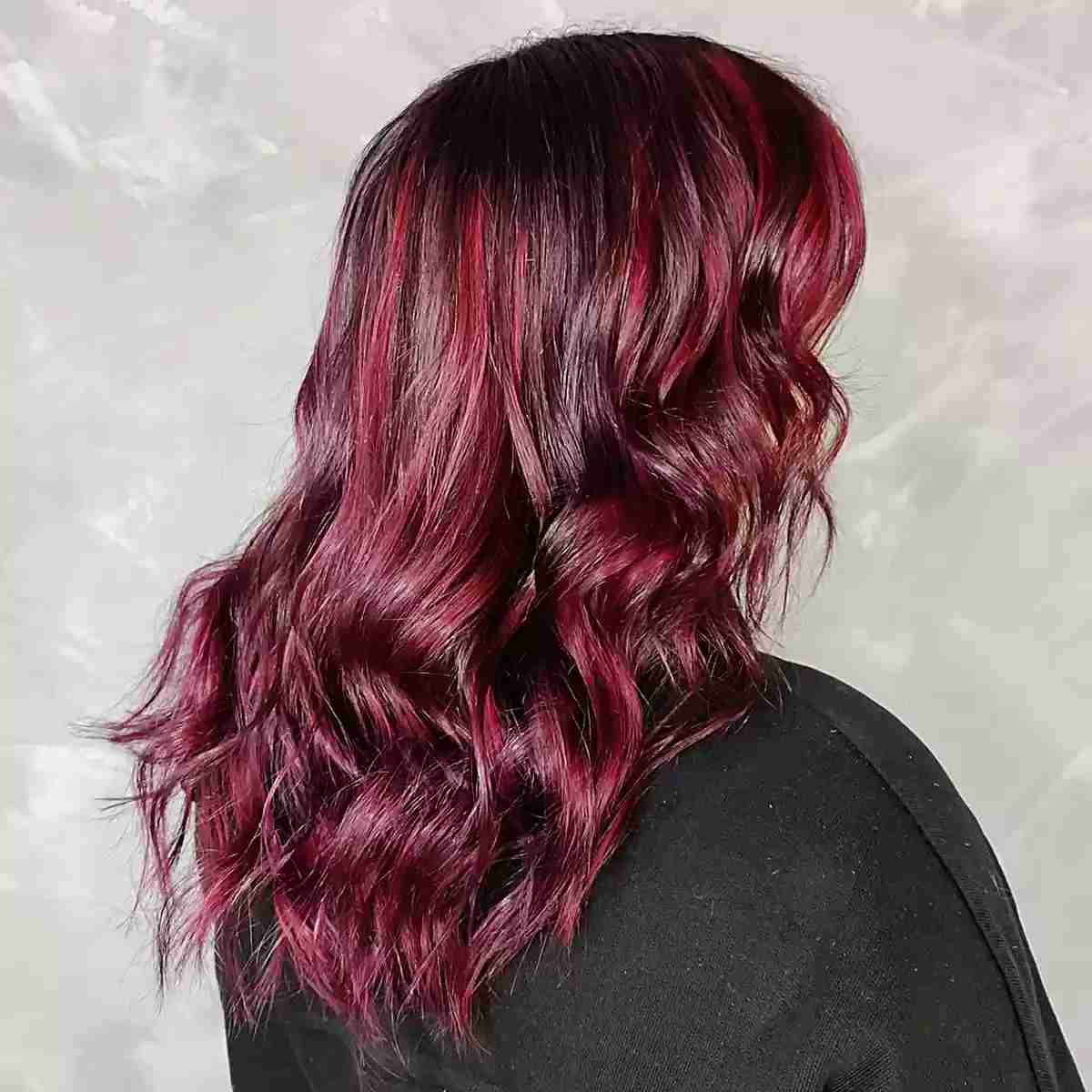 Vibrant Red Burgundy Balayage for Dark Tresses and Wavy Style