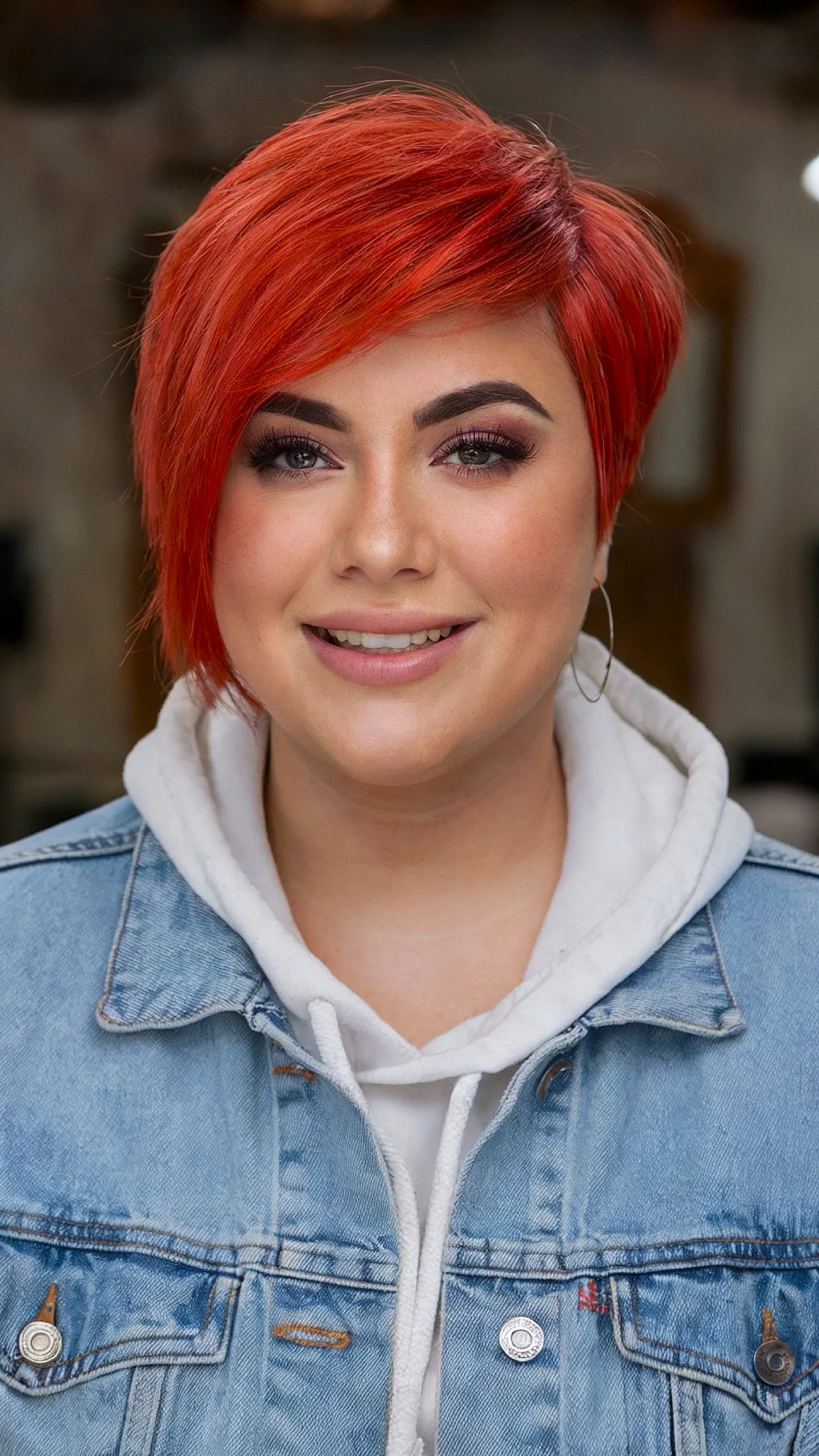 Vibrant Red Long Pixie with Asymmetrical Sides for Women with Round Faces