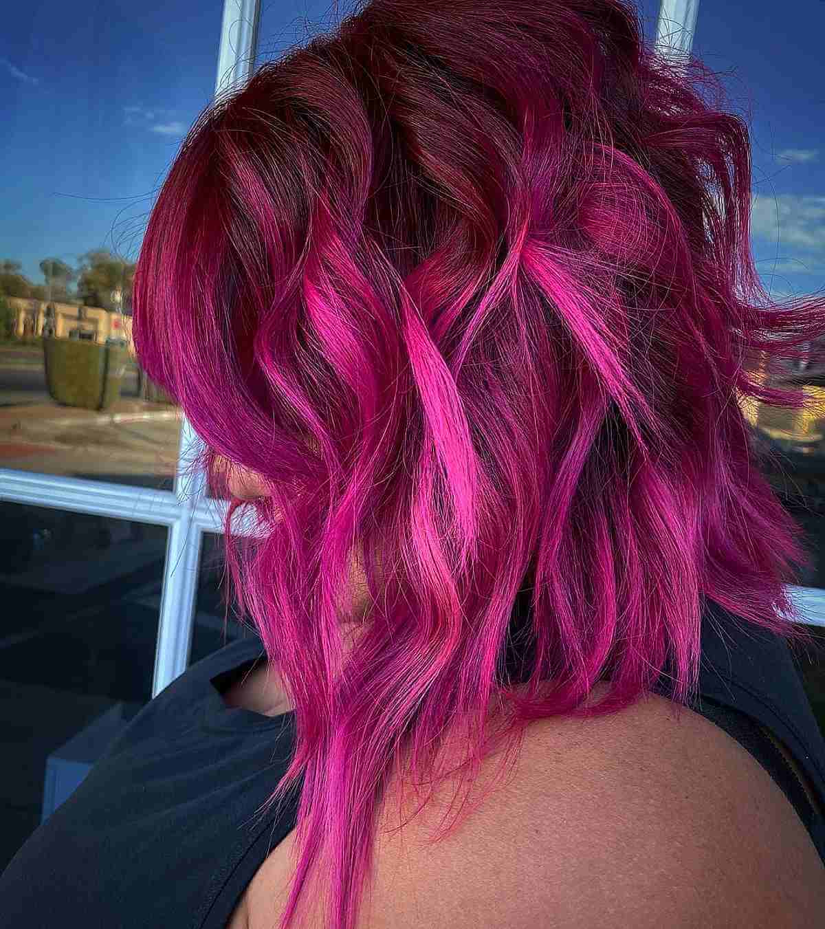 Vibrant Tousled Magenta-Red Bob Cut