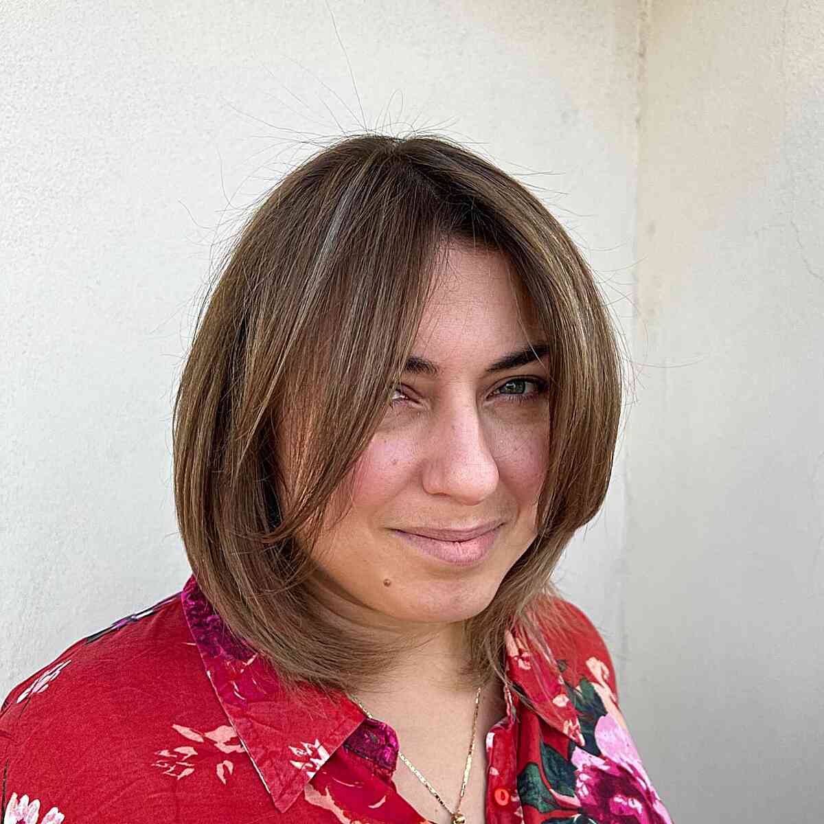 Voluminous Blowout on a Round Medium-Length Bob for Fine Hair