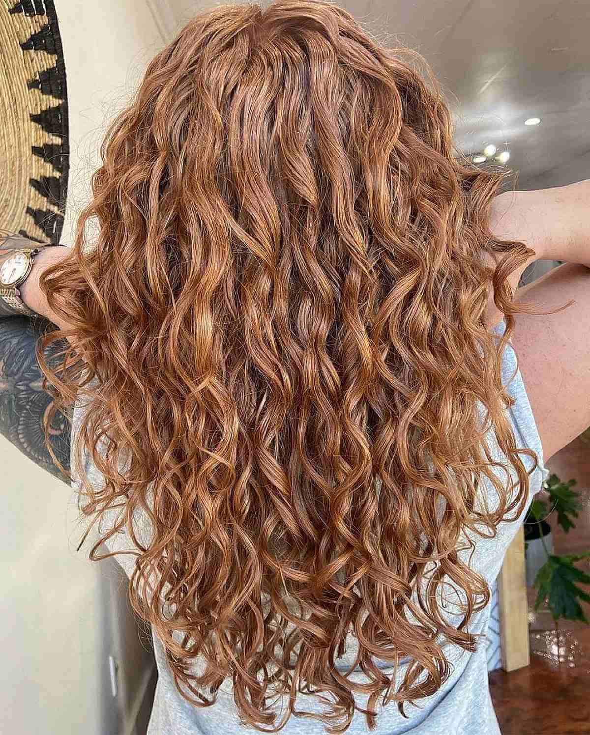 Voluminous Curly Hairdo for Brunette Locks