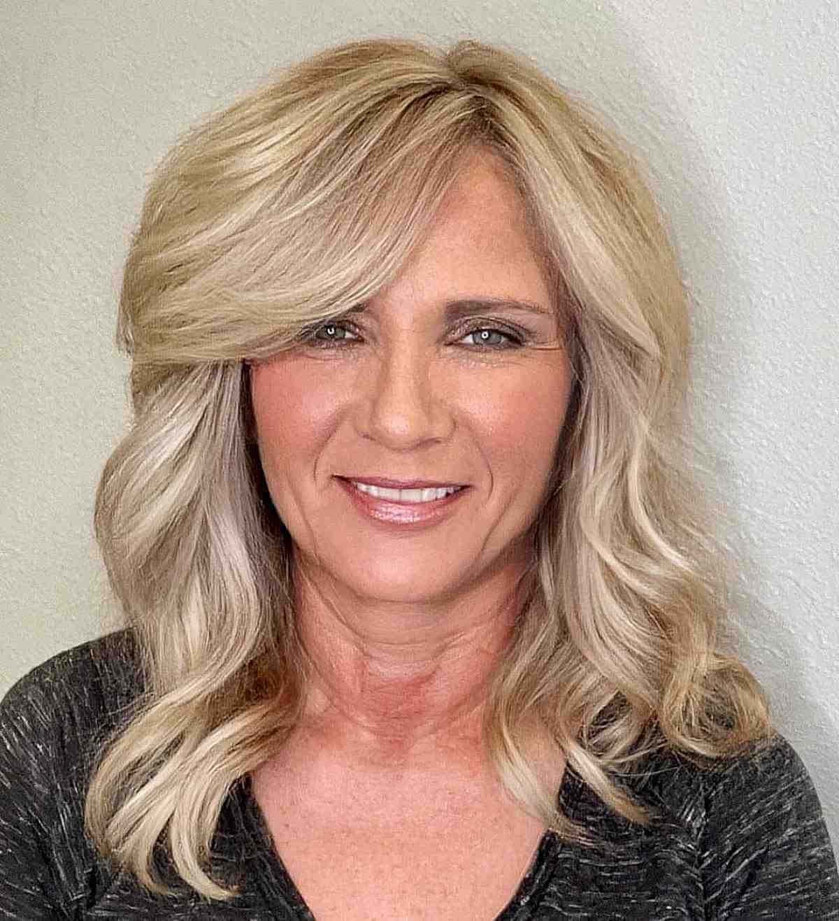 Voluminous Hair with a Dramatic Part for Ladies Past 50