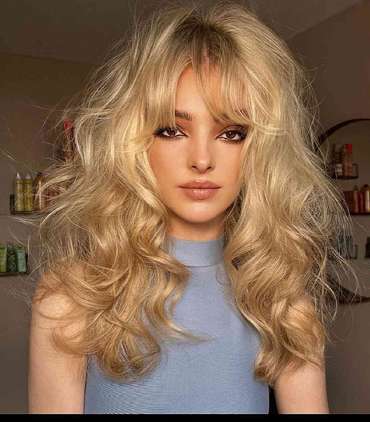 Voluminous Tousled Waves with Center-Parted Bangs