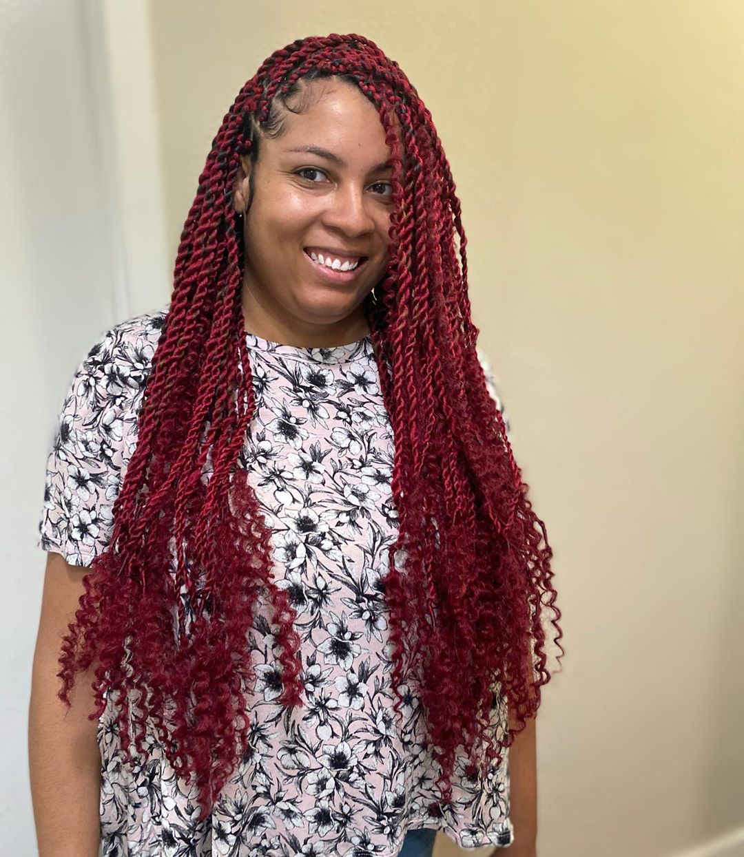 Vibrant Red Hair with Twist Braids and Curly Tips