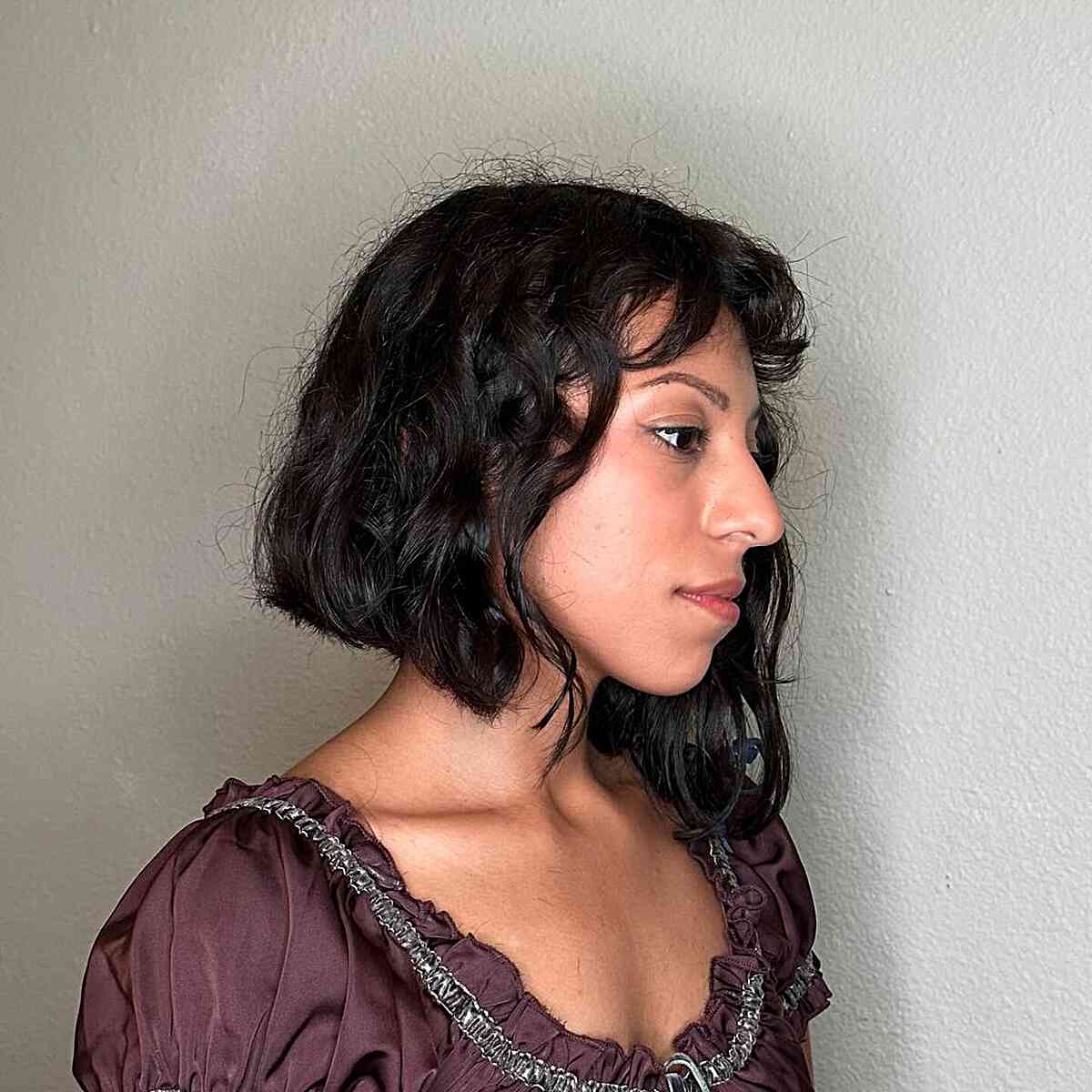 Chin-Length Wavy A-Line Asymmetrical Bob Featuring Short Bangs