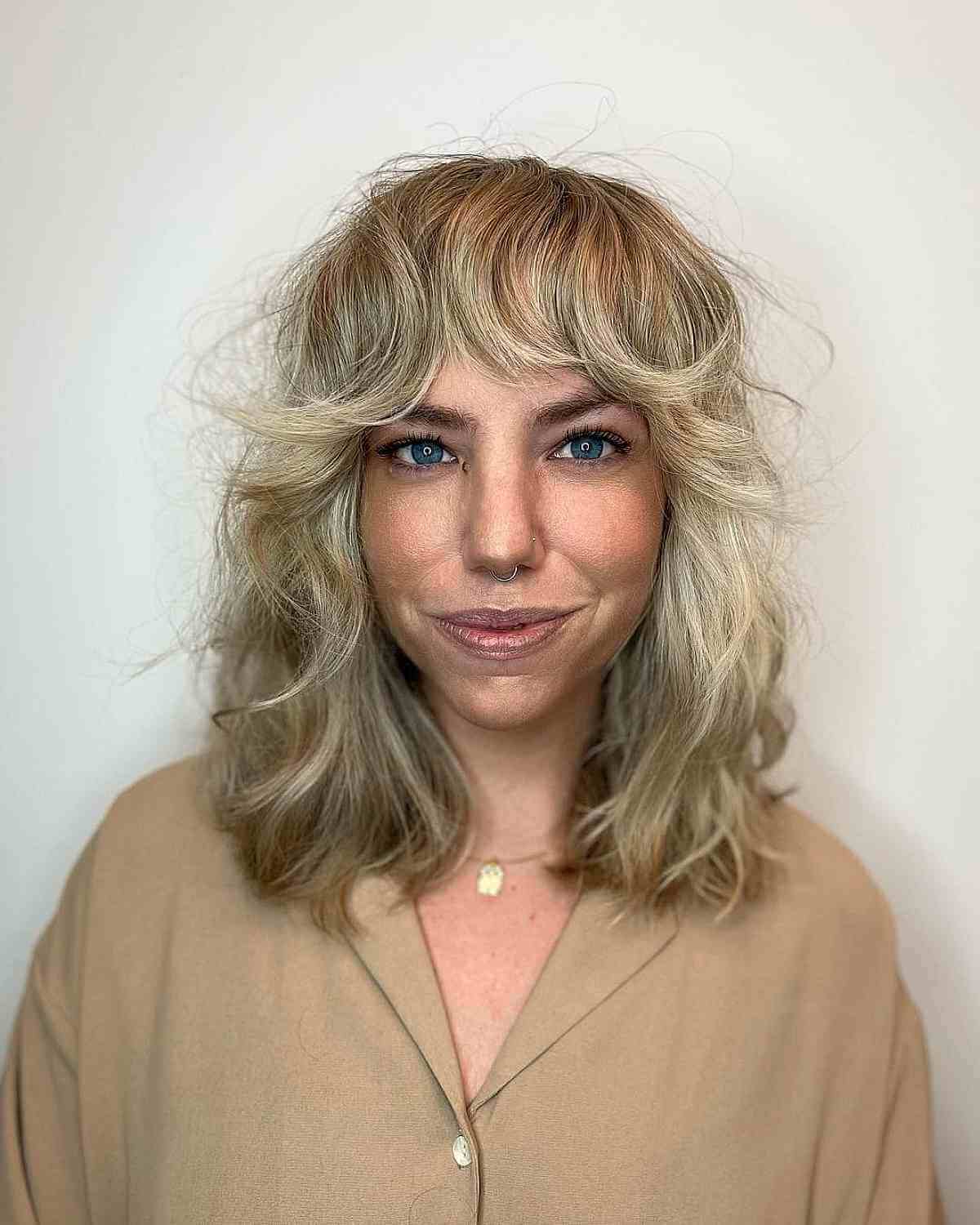 Wavy Bangs on a Shoulder-Length Shag