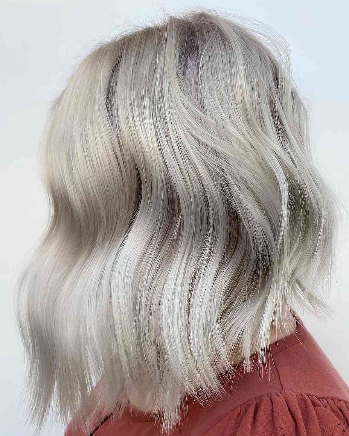 wavy beach long inverted blonde bob