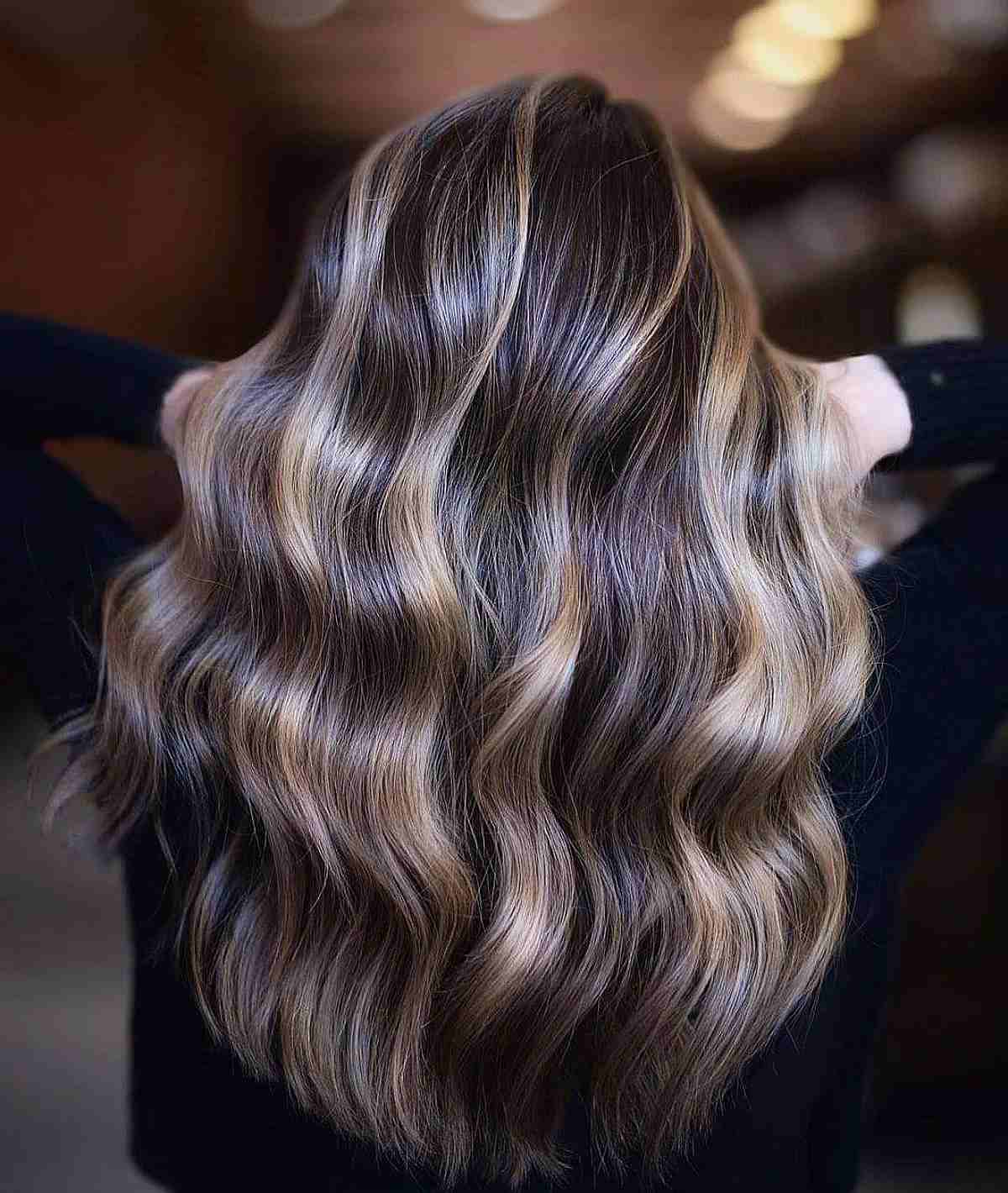 Wavy Chocolate Tresses with Golden Highlights