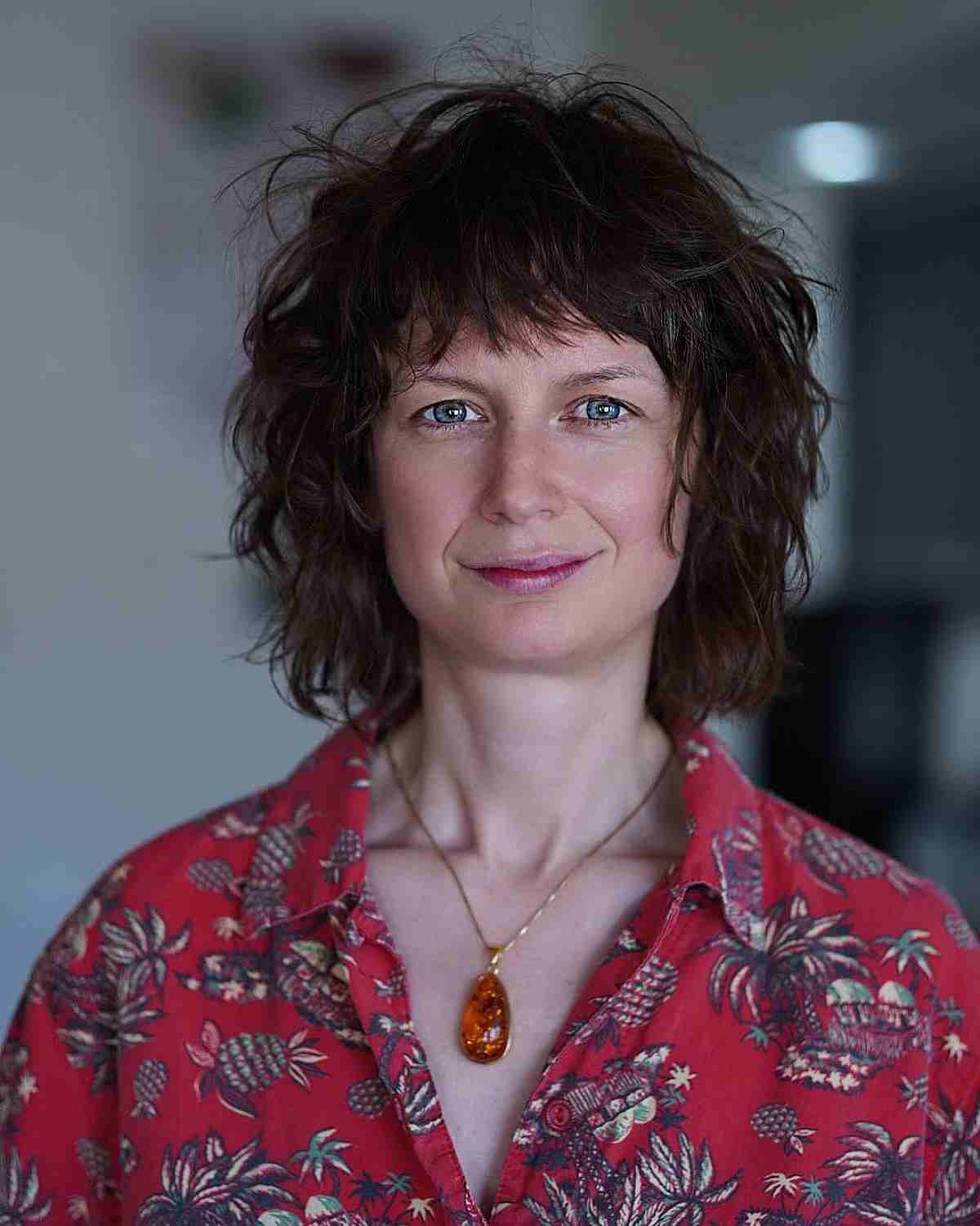 Wavy Layered Bob with Short Bangs