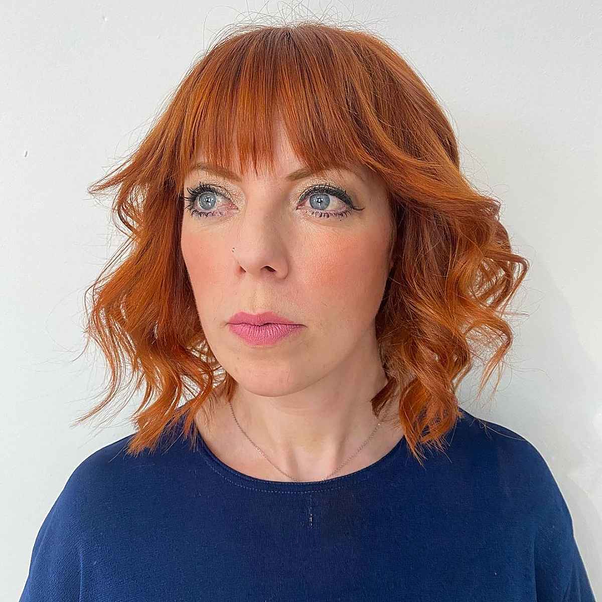 Wavy Long Bob with Fringe and Curls