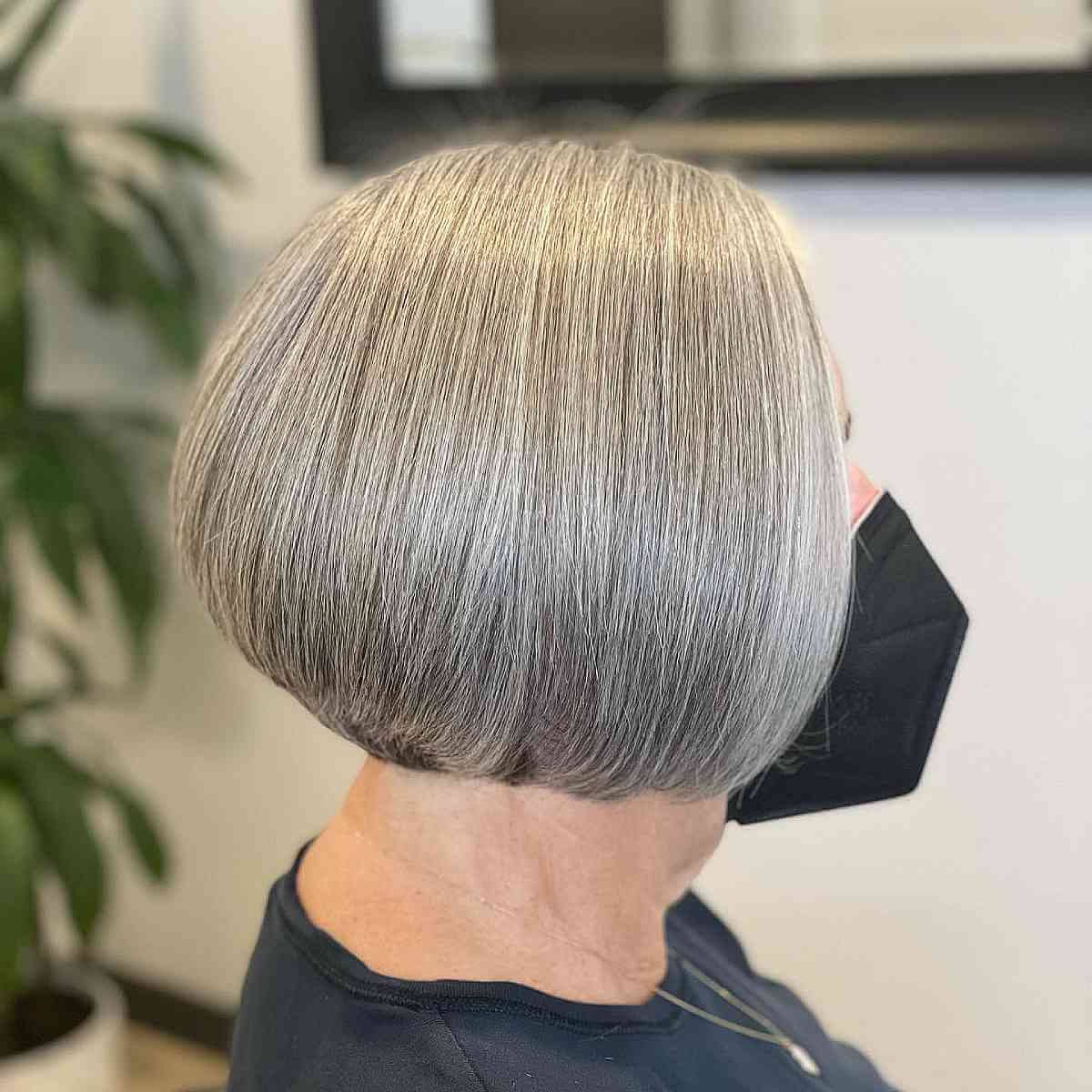 Wedge Bob Hairstyle for Women Over Seventy with Straight Locks