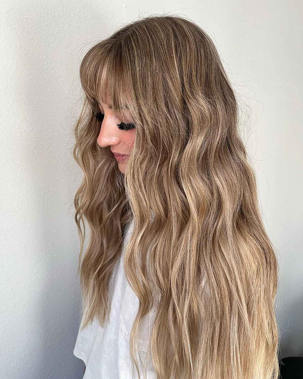 Wispy Middle Parted Bangs on Long Wavy Hair