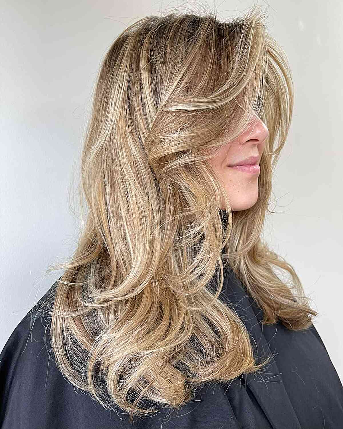 Multi-Layered Medium Butterfly Hair with Honey Balayage Highlights